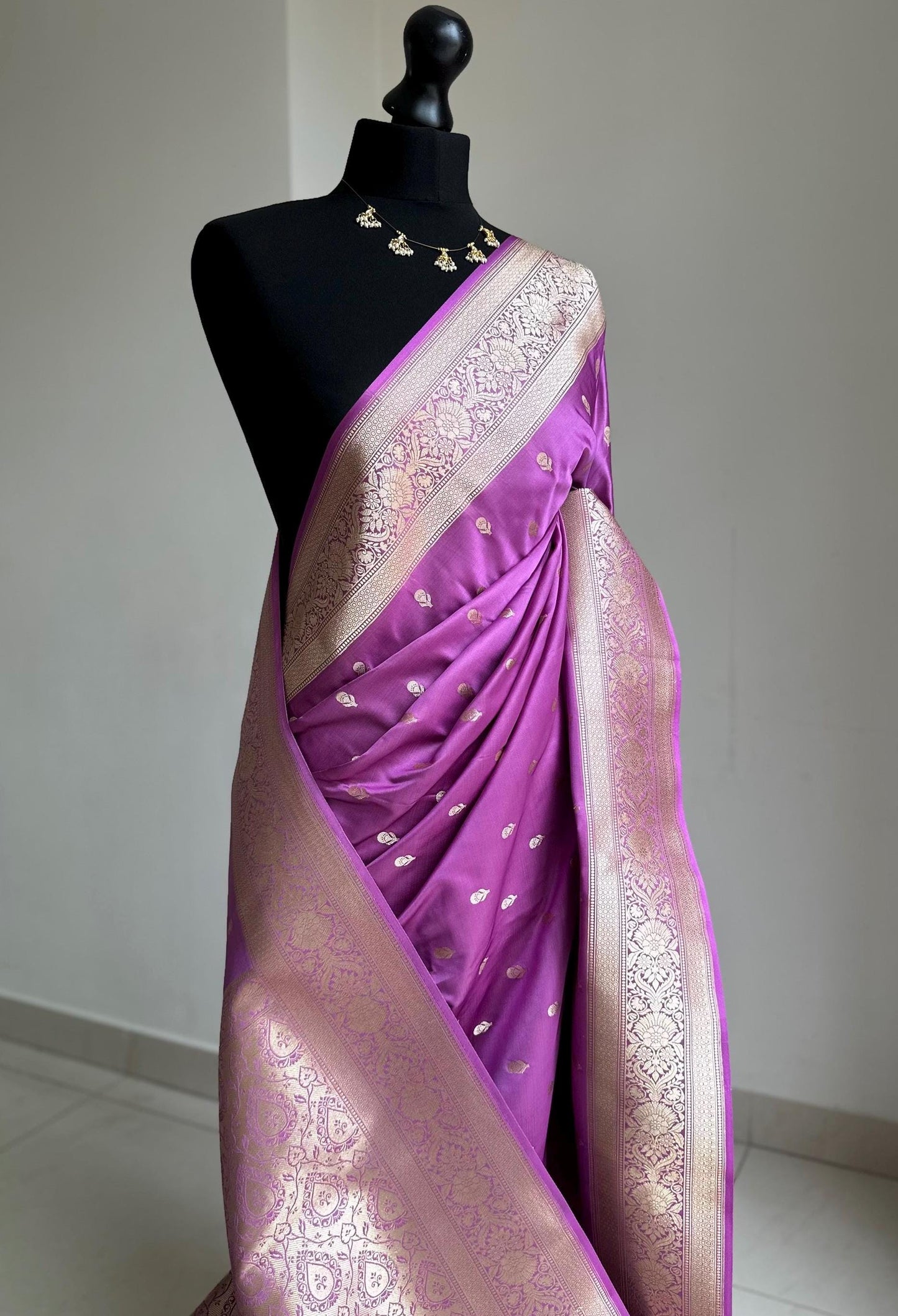 Banarasi silk lavender wedding saree with gold zari. Gold and lavender silk traditional saree with plain contrast blouse with border