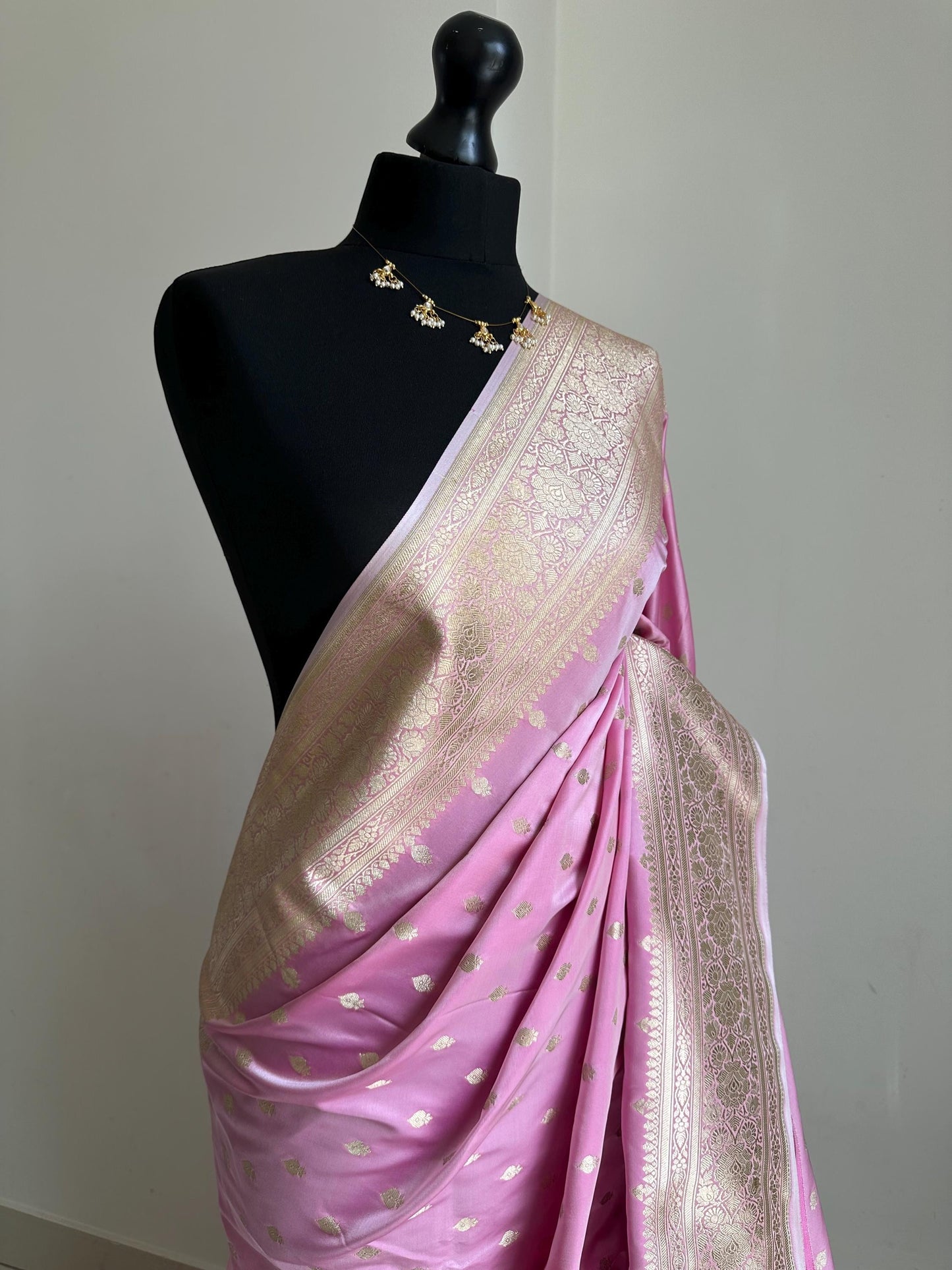 Banarasi silk soft pink wedding saree with gold zari. Gold and baby pink silk traditional saree with plain contrast blouse with border