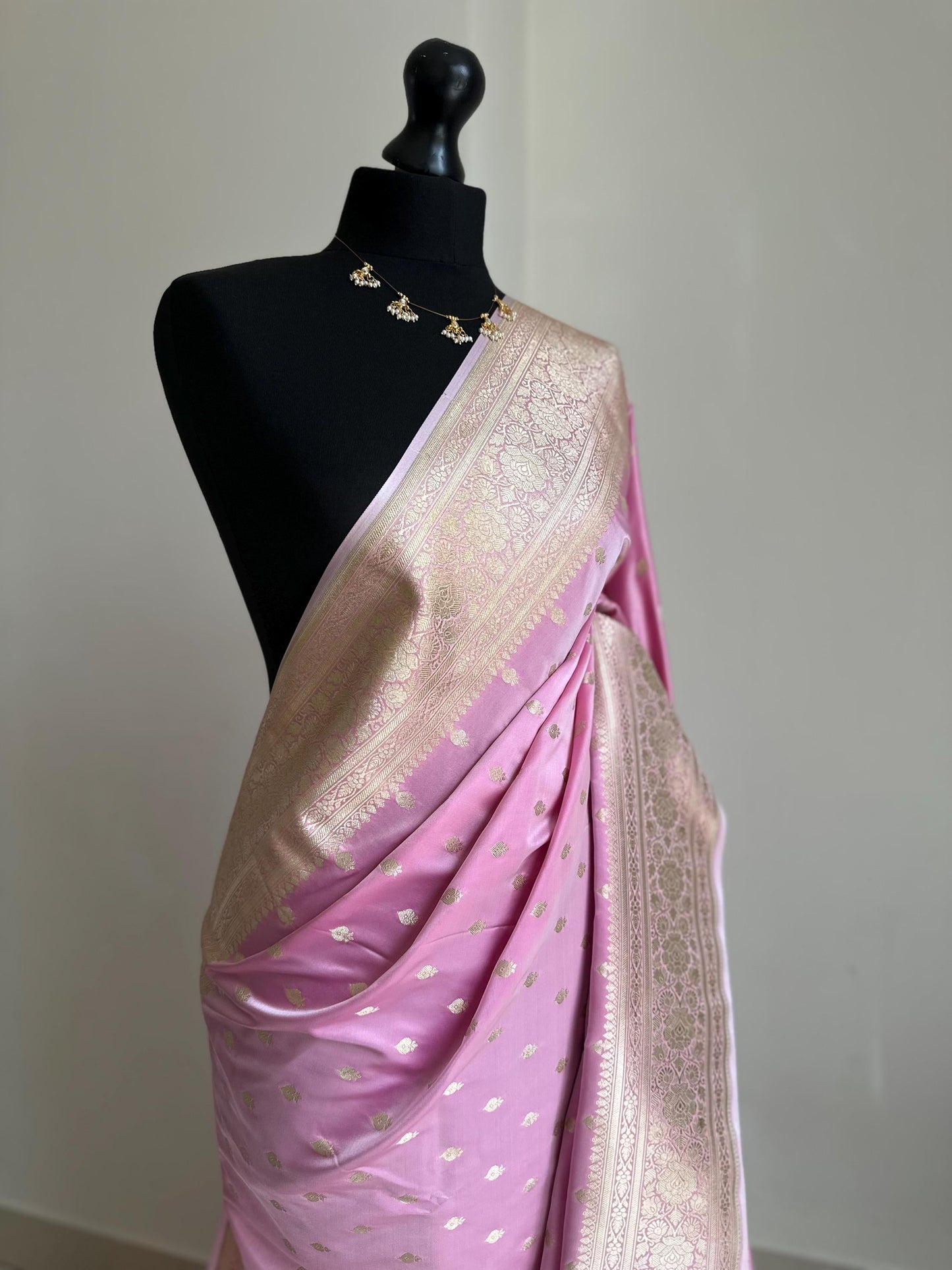 Banarasi silk soft pink wedding saree with gold zari. Gold and baby pink silk traditional saree with plain contrast blouse with border