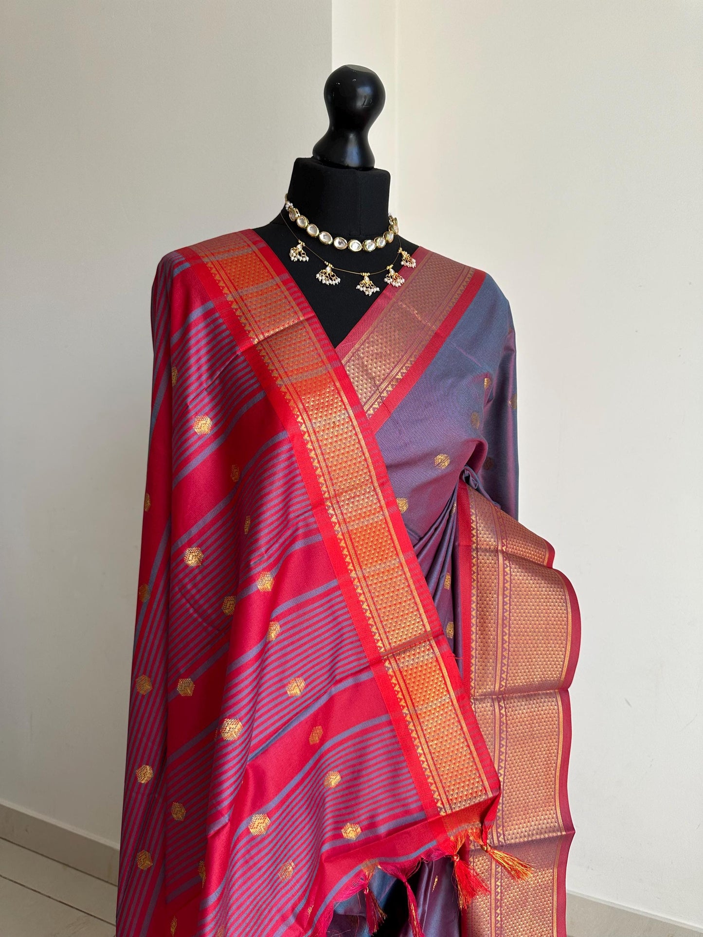 Dusky blue grey semi silk saree with maroon trim and gold zari border. Traditional designer saree beautiful colour and design.