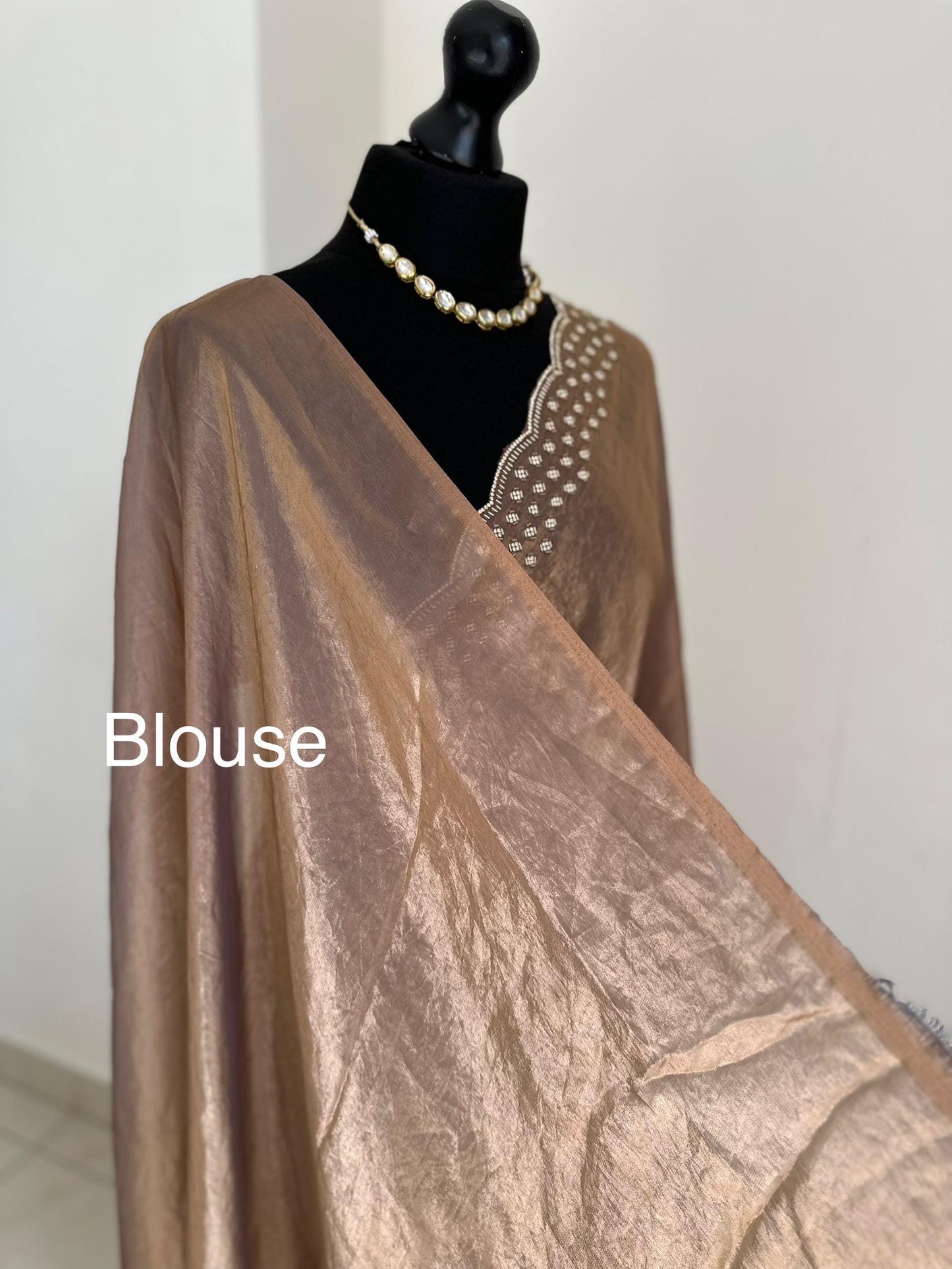 Copper brown party saree with embellished scalloped border. Soft chiffon versatile saree thats perfect for parties and evening events.
