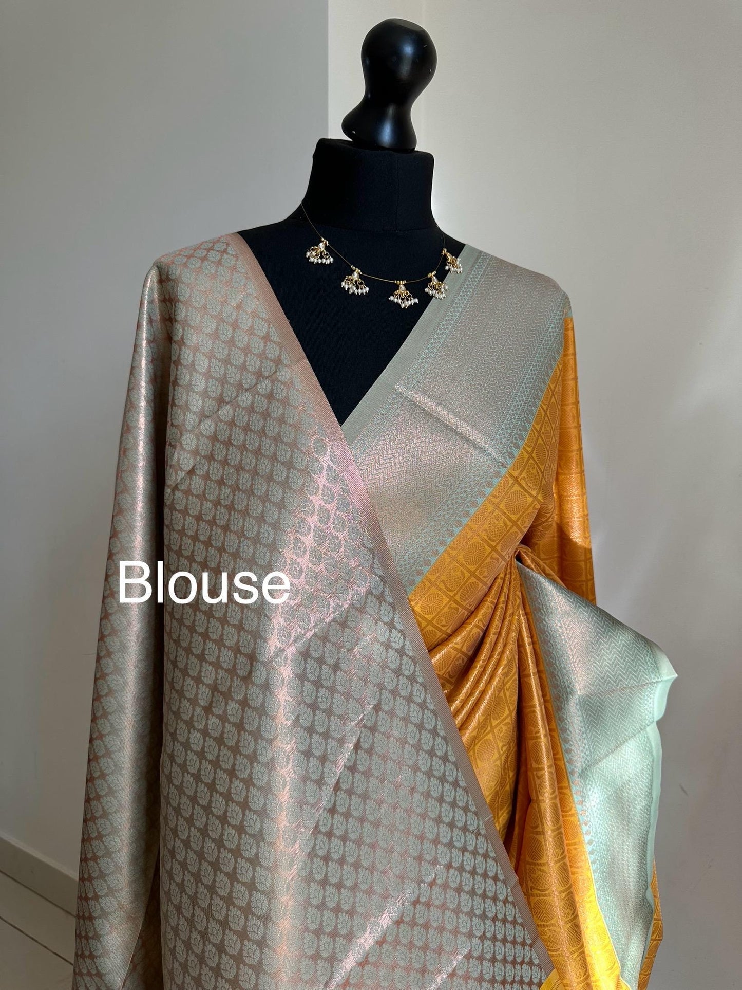Pastel blue and mustard Semi Silk Saree: Gold Zari Border, Unstitched Blouse