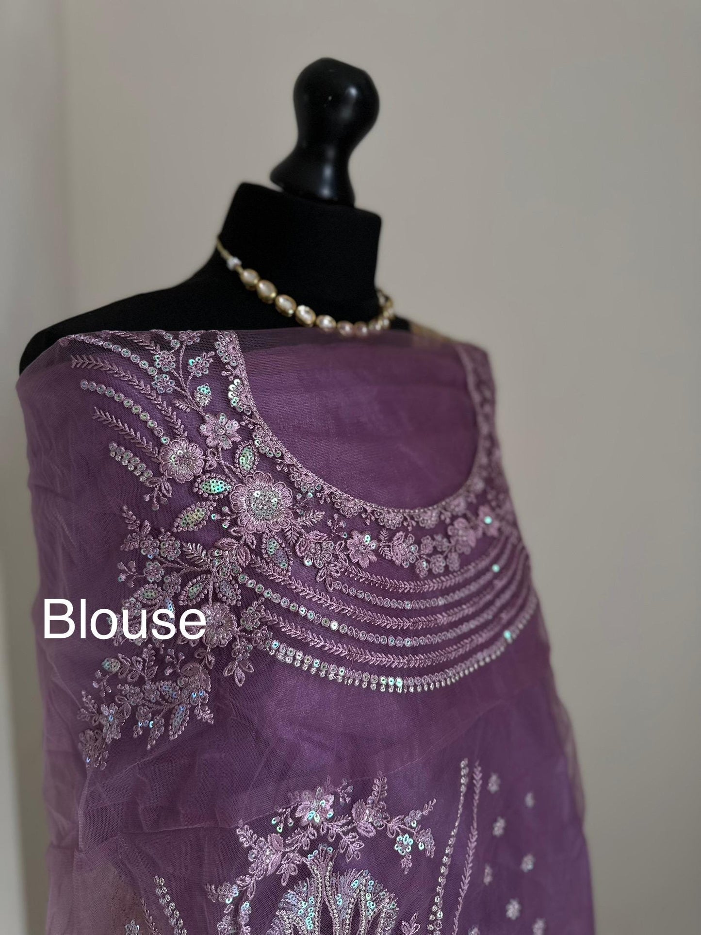 Shaded chiffon party wear Saree with stunning sequin stone embellished border. Lilac purple and mango orange soft lustre saree for occasion