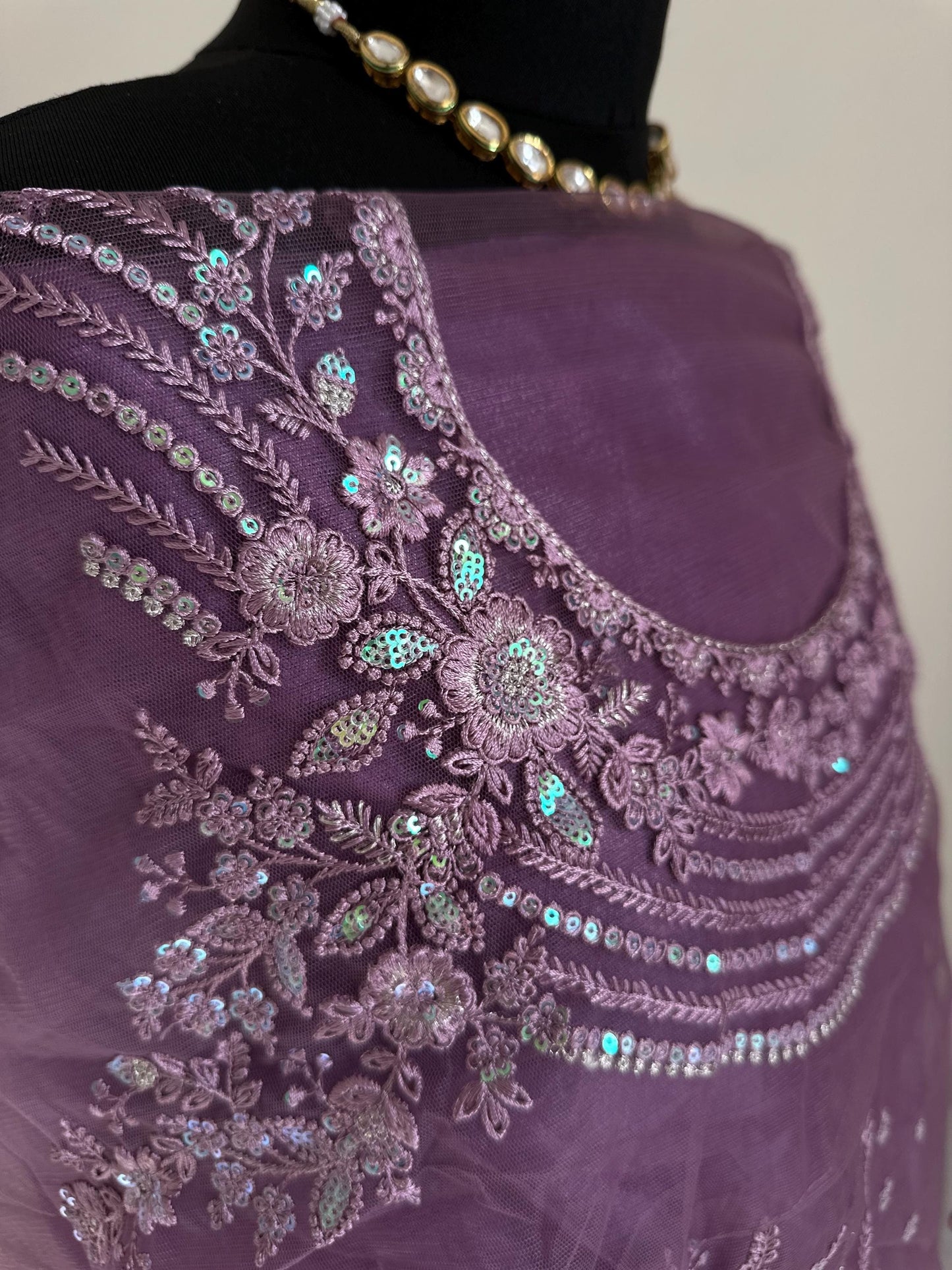 Shaded chiffon party wear Saree with stunning sequin stone embellished border. Lilac purple and mango orange soft lustre saree for occasion