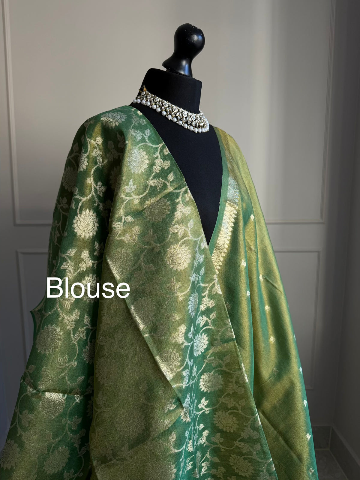 Soft Green & Gold Tissue Silk Saree with Zari Motifs with floral detail blouse