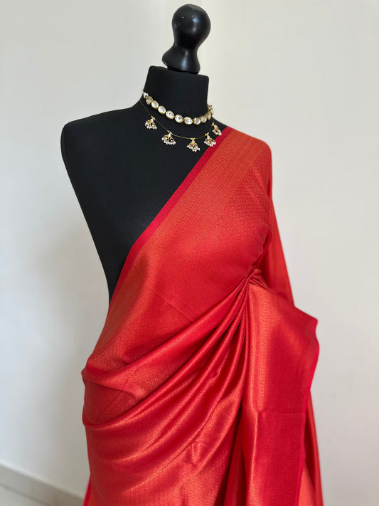 Red softy silk kubera pattu saree with an exquisite sheen and classy look. Perfect red shade saree suitable for wedding parties and events