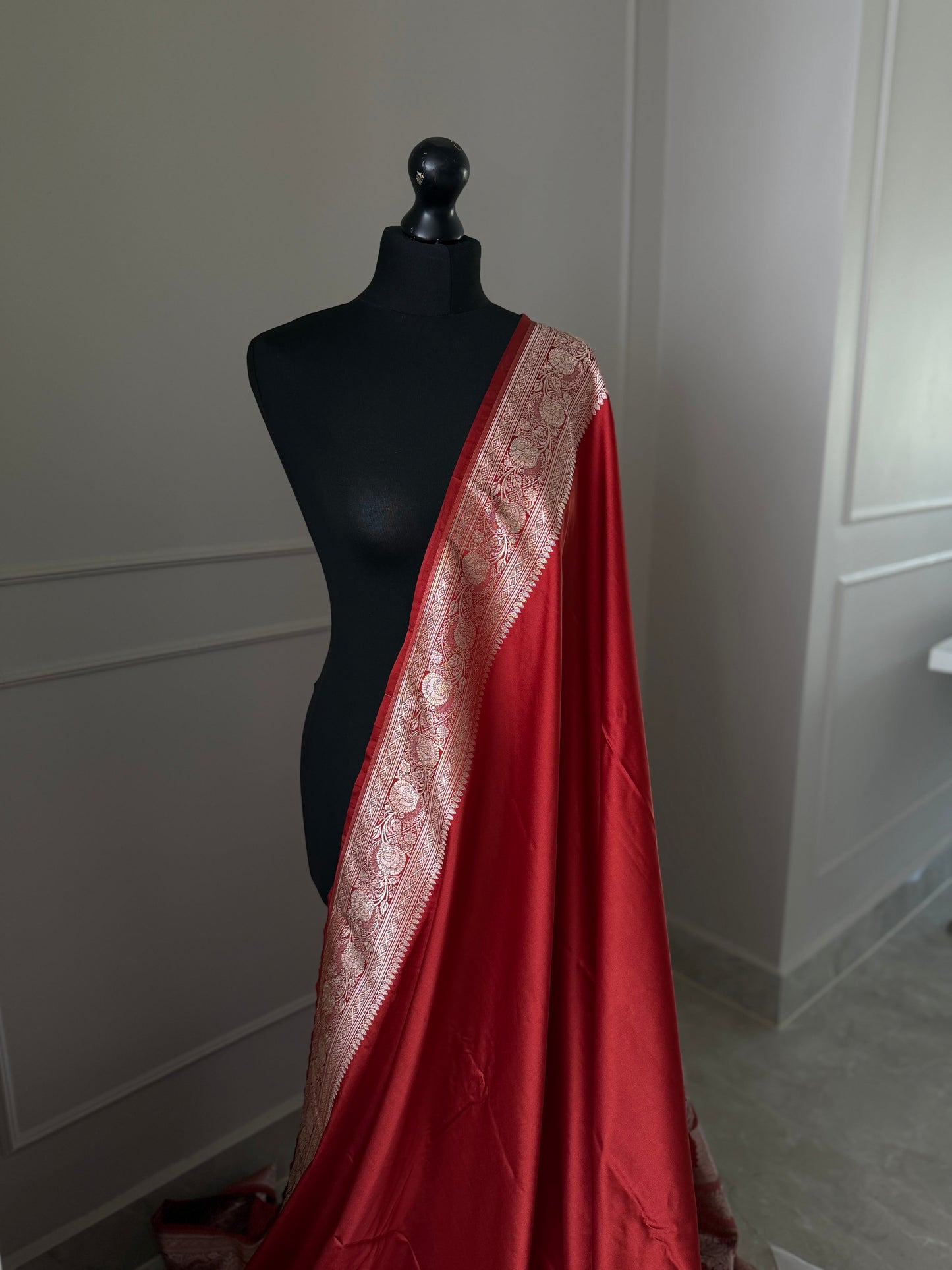 Banarasi silk crimson red mashru wedding saree with  gold zari. Red traditional silk saree with designer patterned blouse.