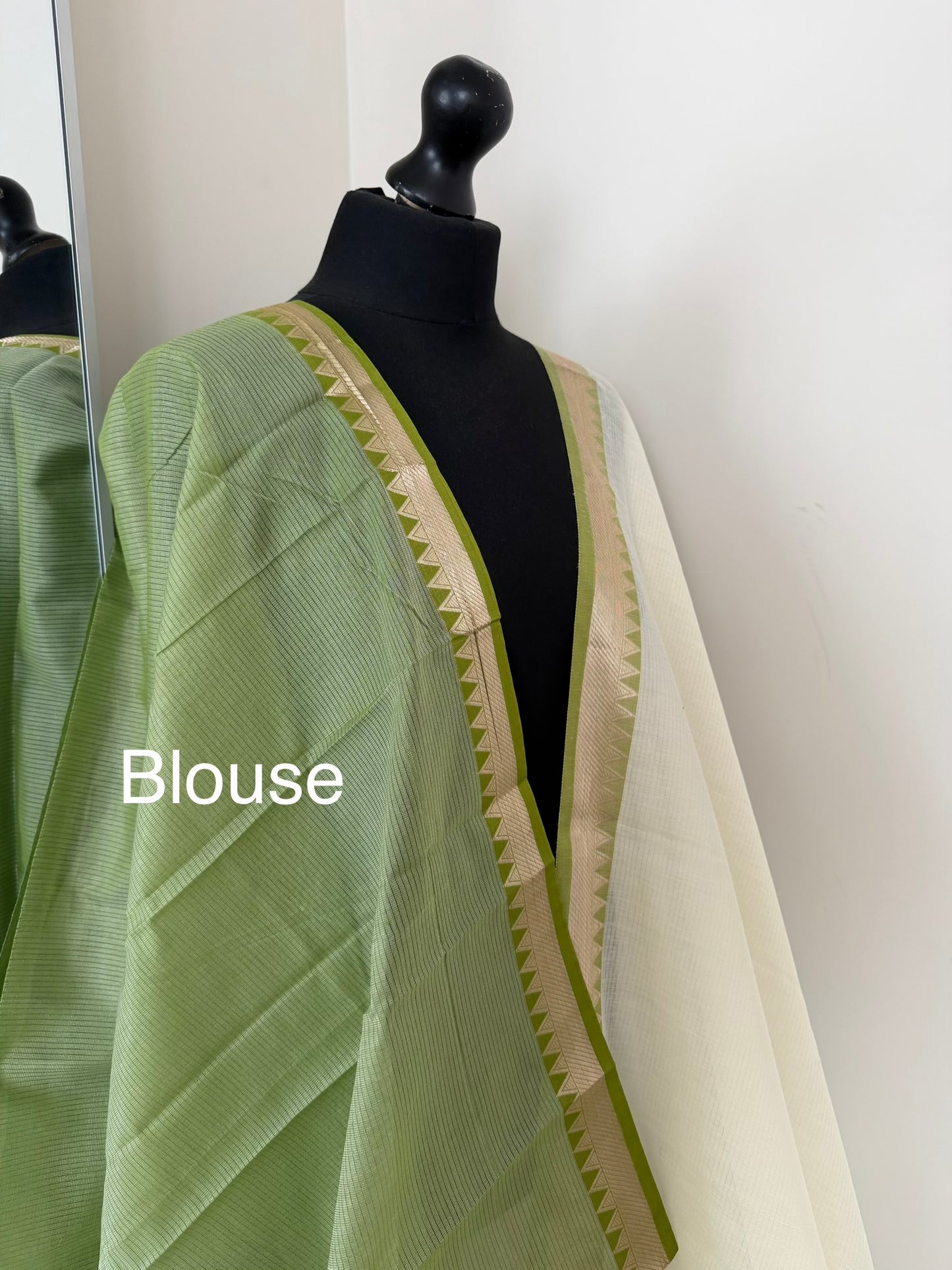 Elegant white cotton saree with green zari border