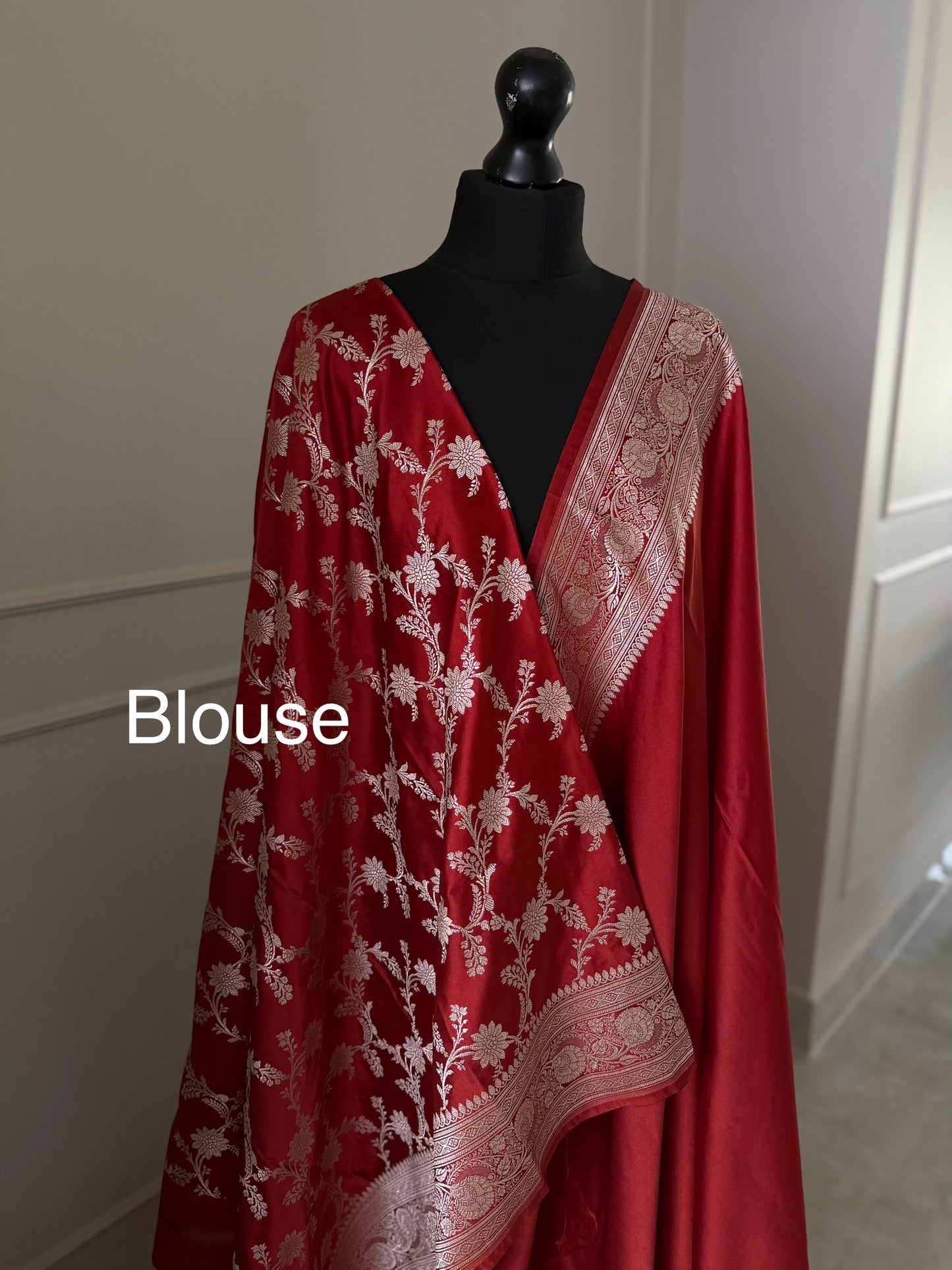 Banarasi silk crimson red mashru wedding saree with  gold zari. Red traditional silk saree with designer patterned blouse.