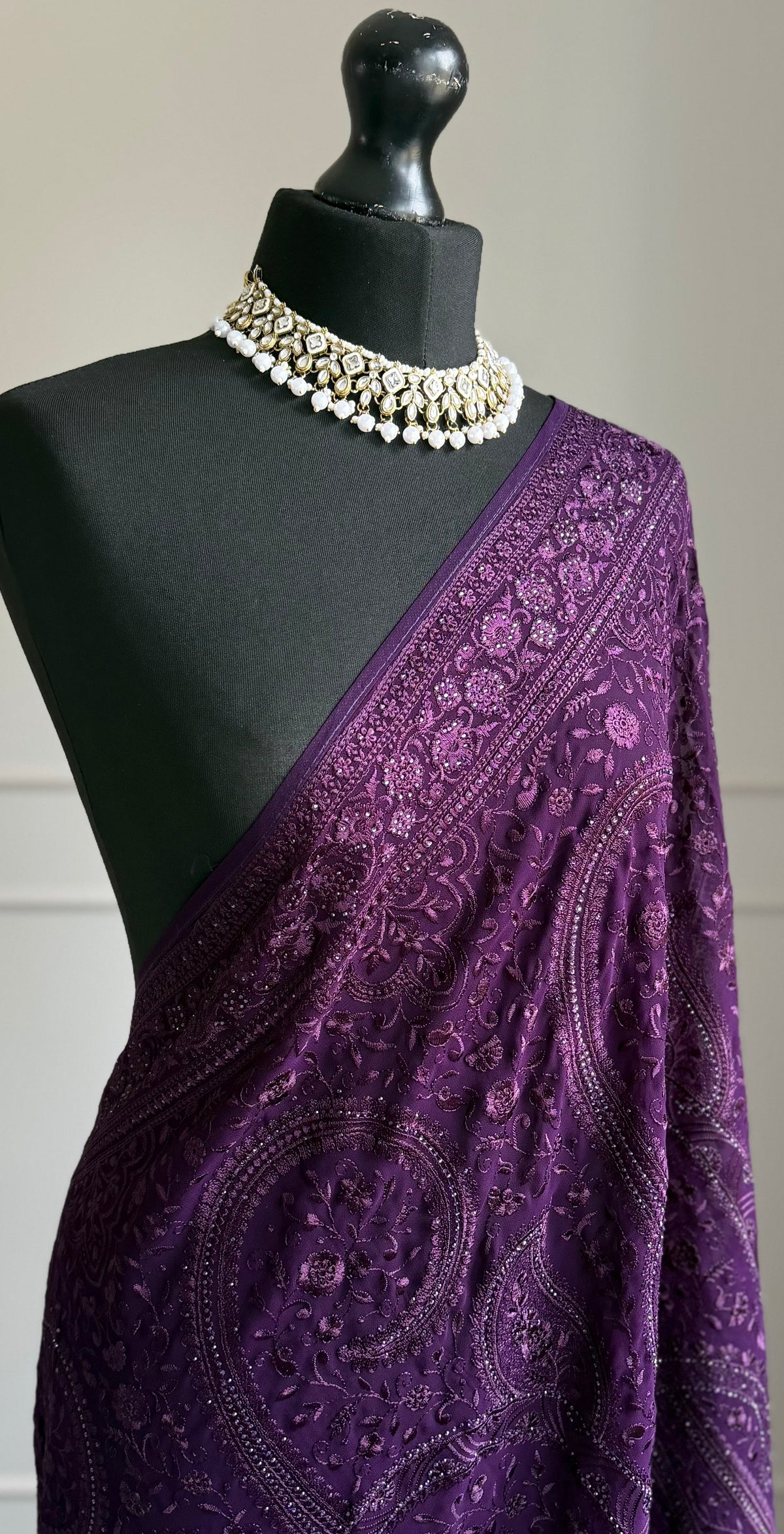 Purple fully embroidered saree with stone work detailing