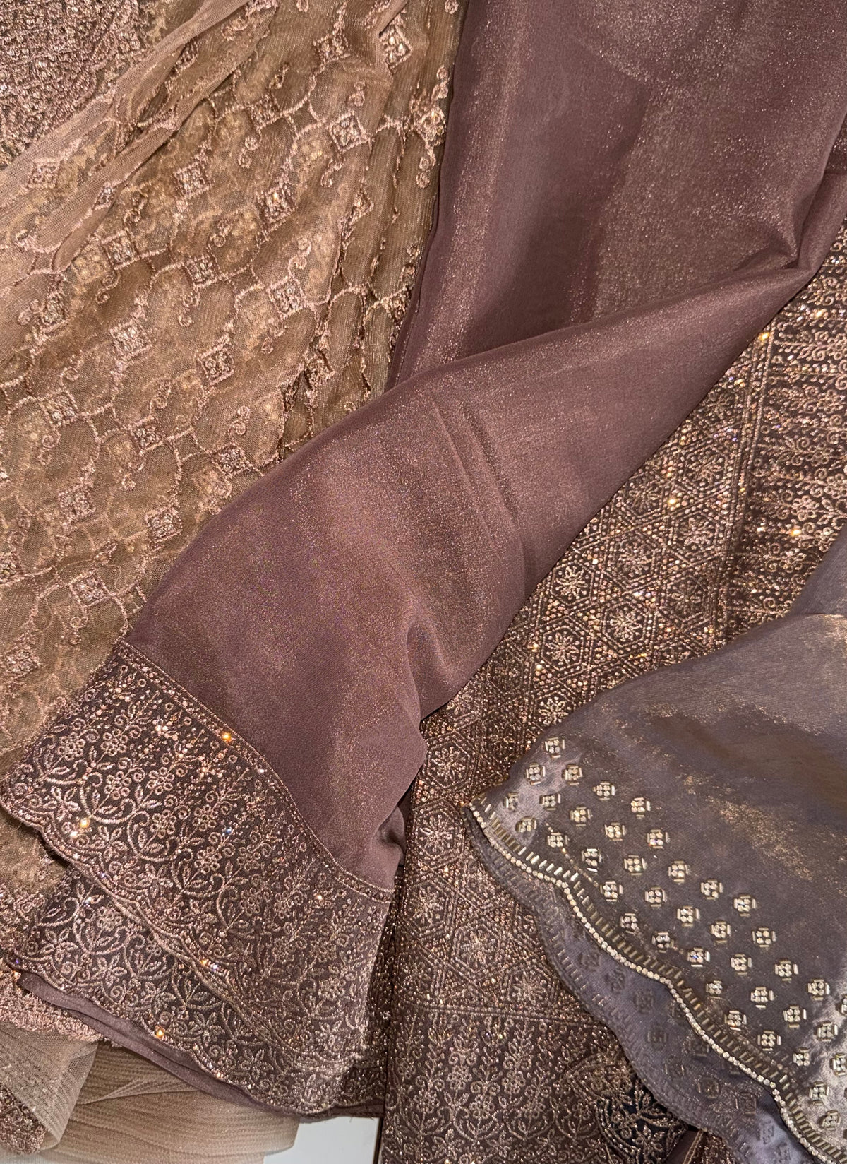 Mocha brown georgette saree with stone work border and pallu