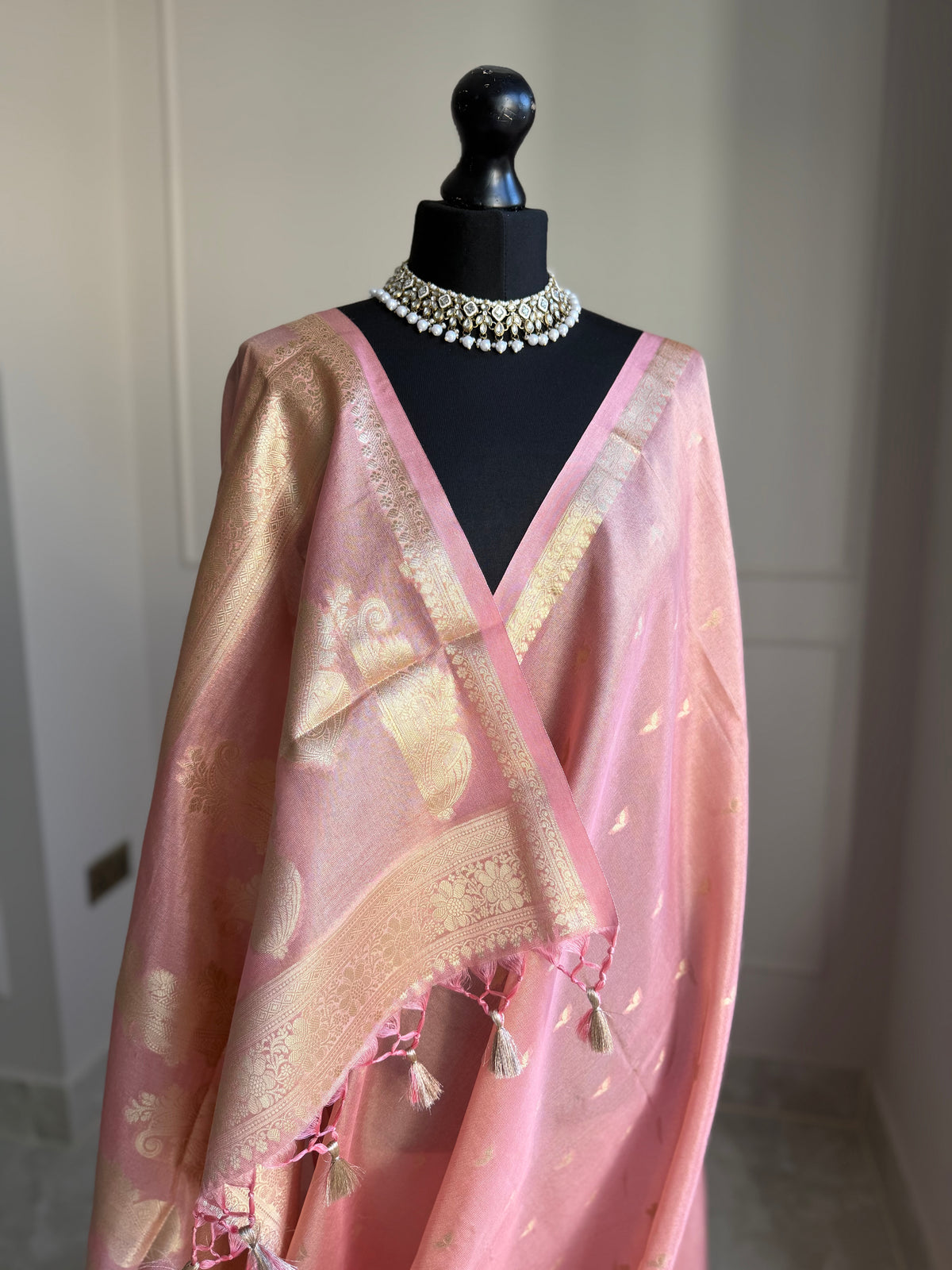 Romantic tissue silk saree in pretty pink and gold zari