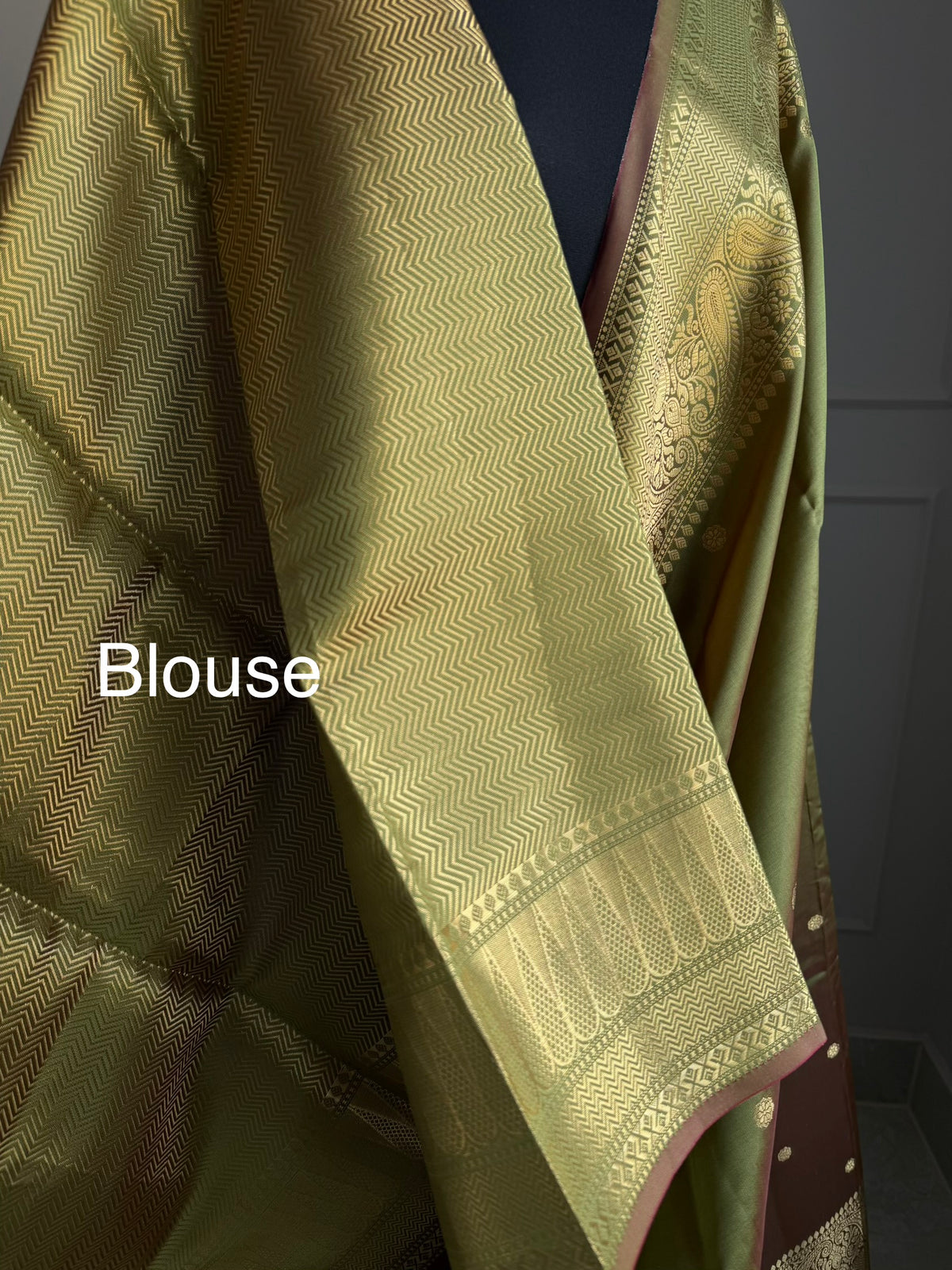 Olive green and maroon hues dual tone silk saree with gold zari border