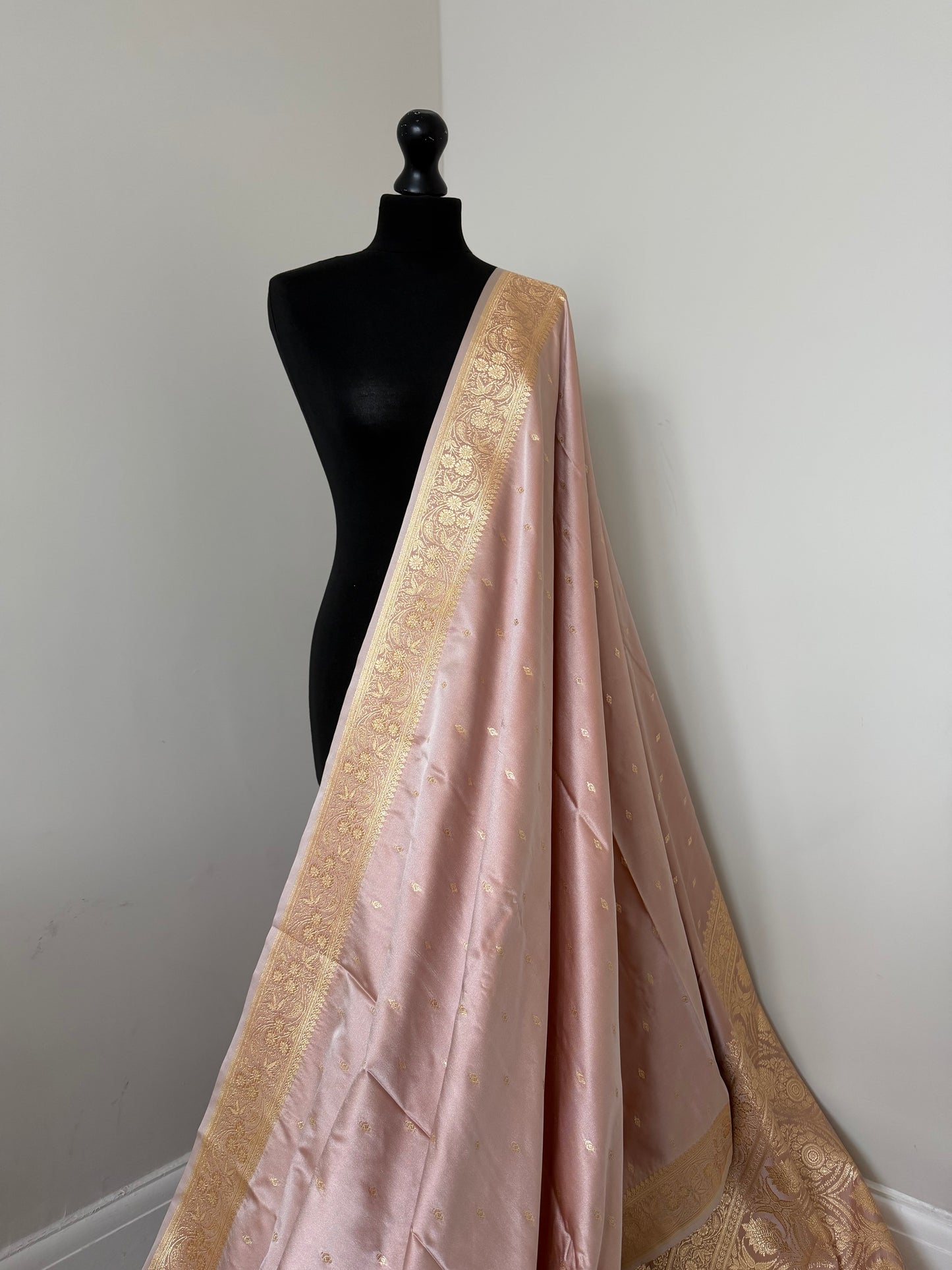 Banarasi silk beige blush pink wedding saree with gold Zari.