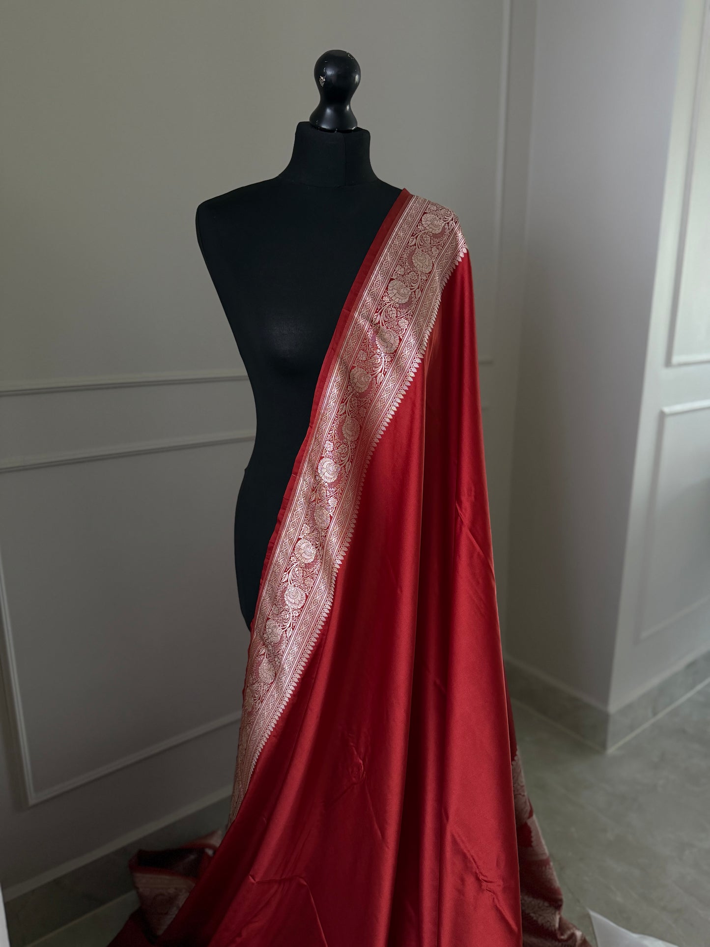 Banarasi silk crimson red mashru wedding saree with  gold zari. Red traditional silk saree with designer patterned blouse.