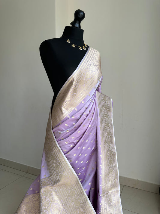 Banarasi silk soft dreamy lilac wedding saree with gold zari. Gold and lilac silk traditional saree with plain contrast blouse with border