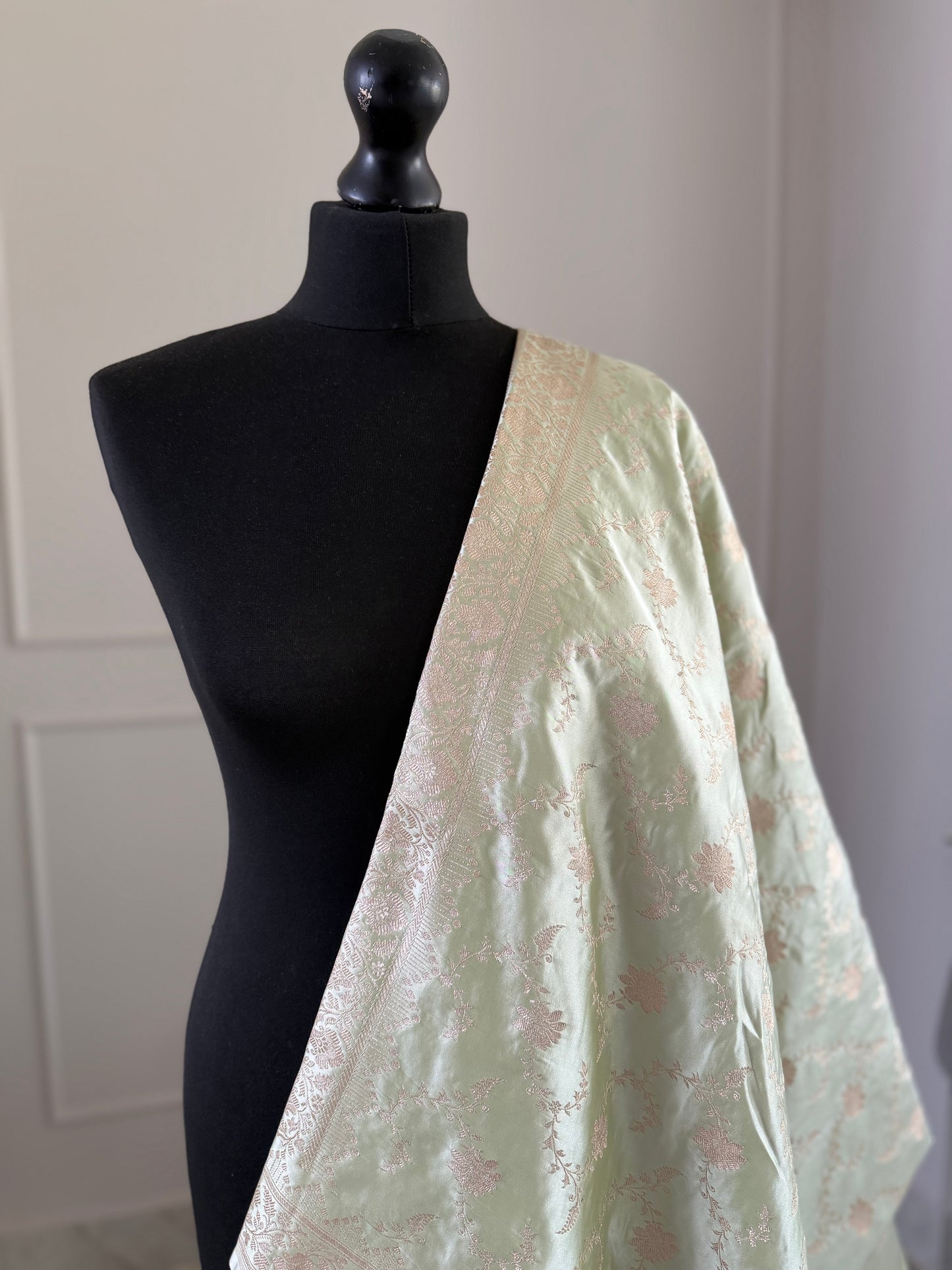 Elegant muted sage green Banarasi Saree with champagne gold Zari
