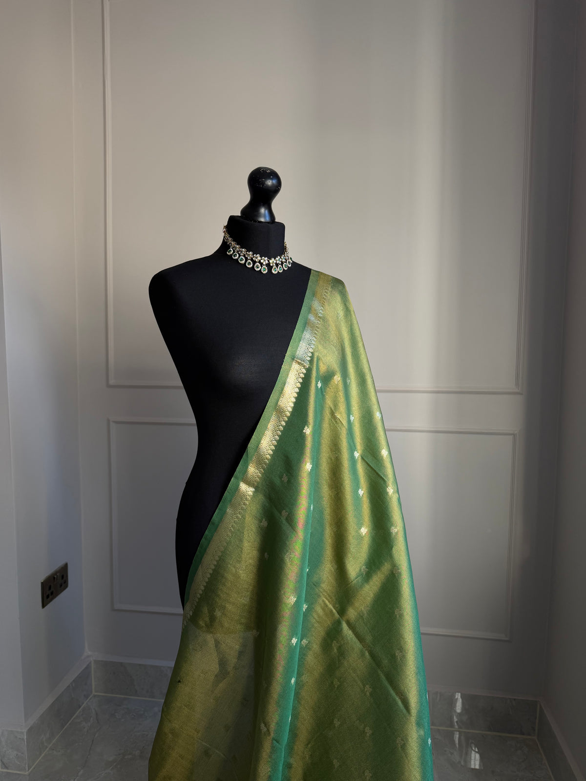Soft Green & Gold Tissue Silk Saree with Zari Motifs with floral detail blouse