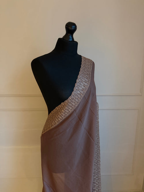 Mocha brown georgette saree with stone work border and pallu