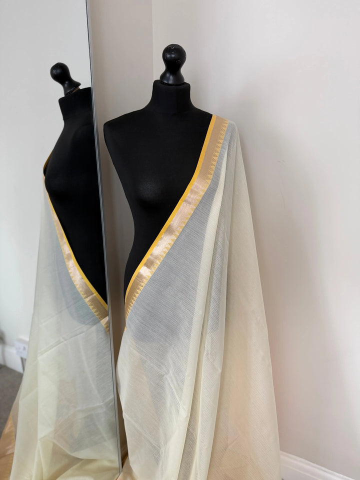 Elegant white cotton saree with yellow zari border LaiLai Sarees