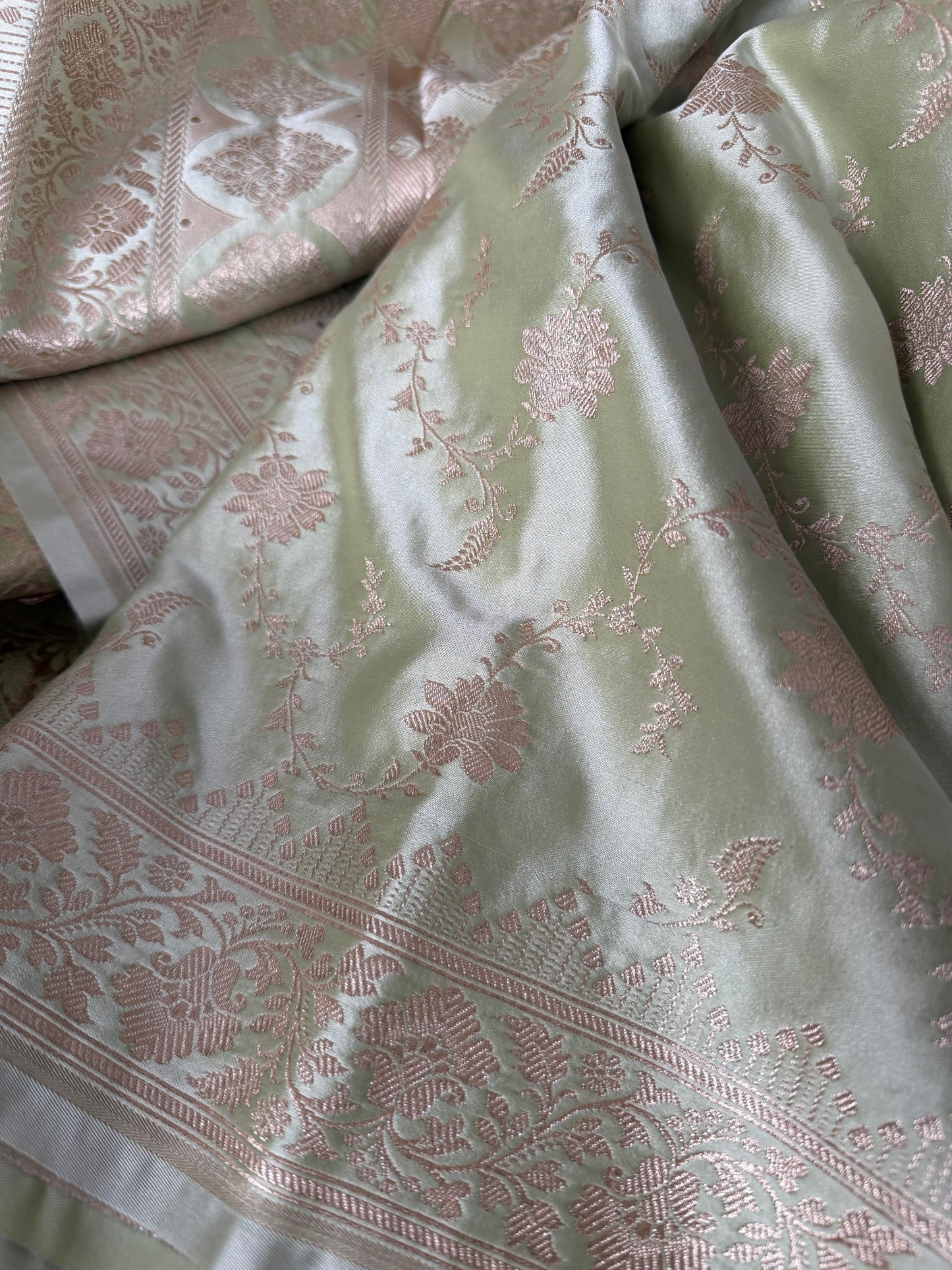 Elegant muted sage green Banarasi Saree with champagne gold Zari