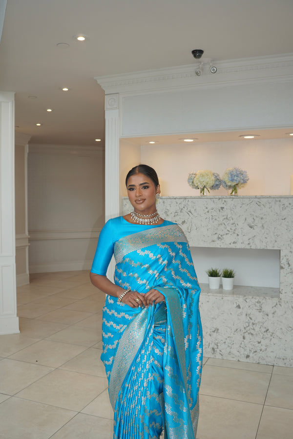 Banarasi silk peacock blue wedding saree with silver zari. Exquisite blue semi silk saree with plain contrast blouse. Stylish elegant saree