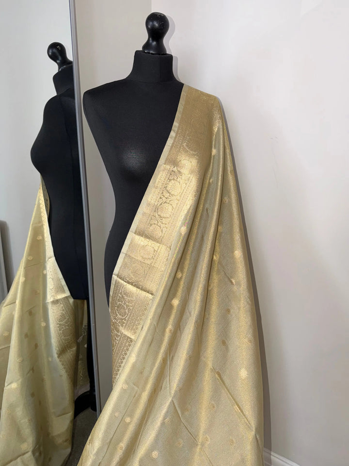 Ivory cream and Gold Tissue Saree: Soft to drape with zari border and butas LaiLai Sarees