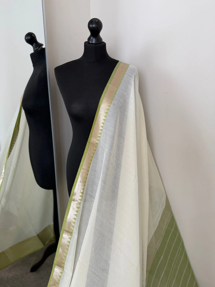 Elegant white cotton saree with green zari border LaiLai Sarees