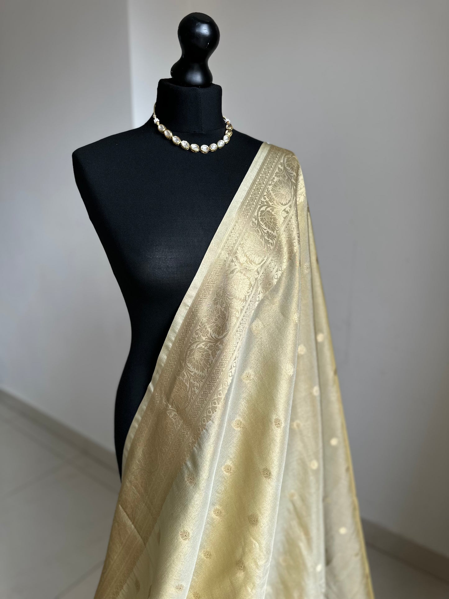 Ivory cream and Gold Tissue Saree: Soft to drape with zari border and butas