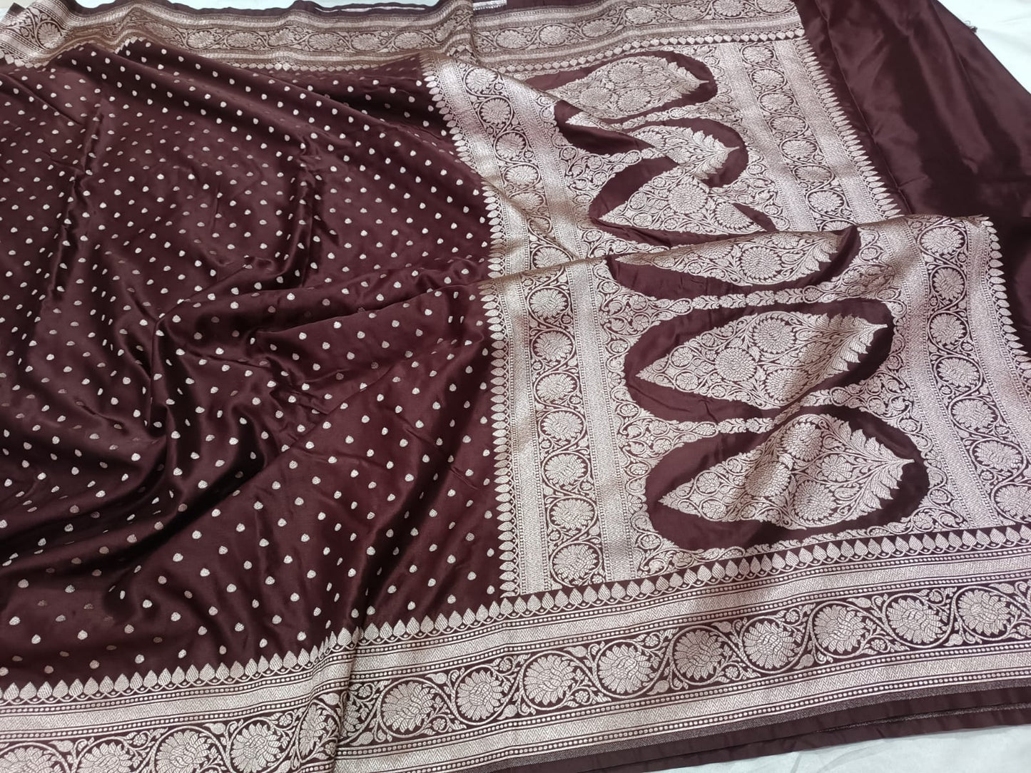Chocolate brown Banarasi wedding saree with gold Zari.
