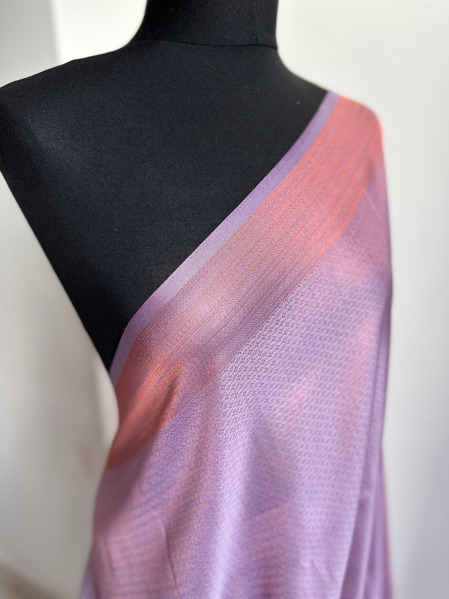 Lilac soft silk saree with a copper border and all over sheen. The perfect saree for parties and all traditional events. Versatile saree