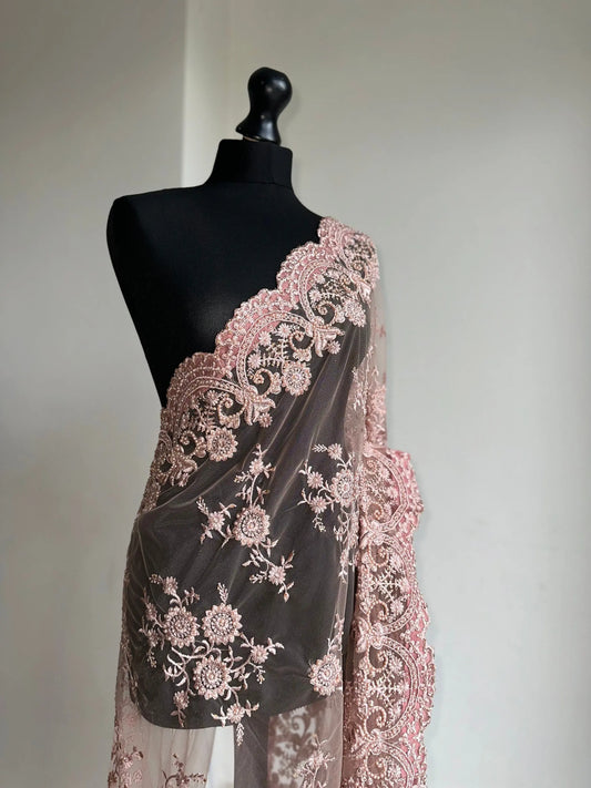 Nude pink lace saree for parties. Intricate lace designer saree with matching petticoat and blouse unstitched. Wedding or party saree - LaiLai Sarees