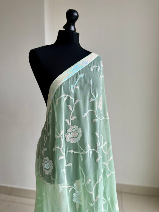 Mint Green Party saree with sequins and floral vine. Wedding guest civil wedding party wear with iridescent sequins all over georgette saree