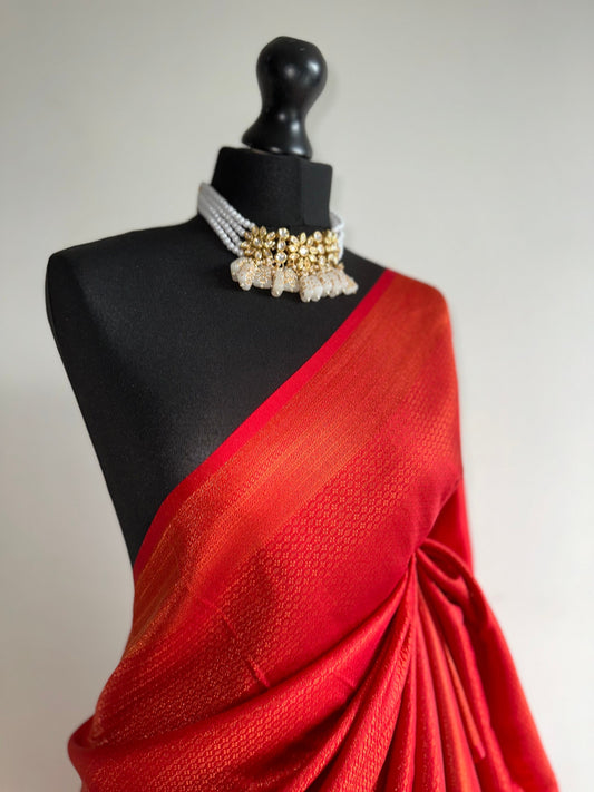 Red softy silk kubera pattu saree with an exquisite sheen and classy look. Perfect red shade saree suitable for wedding parties and events