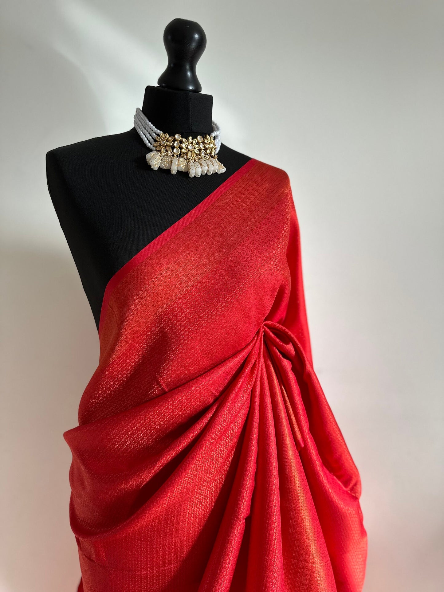 Red softy silk kubera pattu saree with an exquisite sheen and classy look. Perfect red shade saree suitable for wedding parties and events