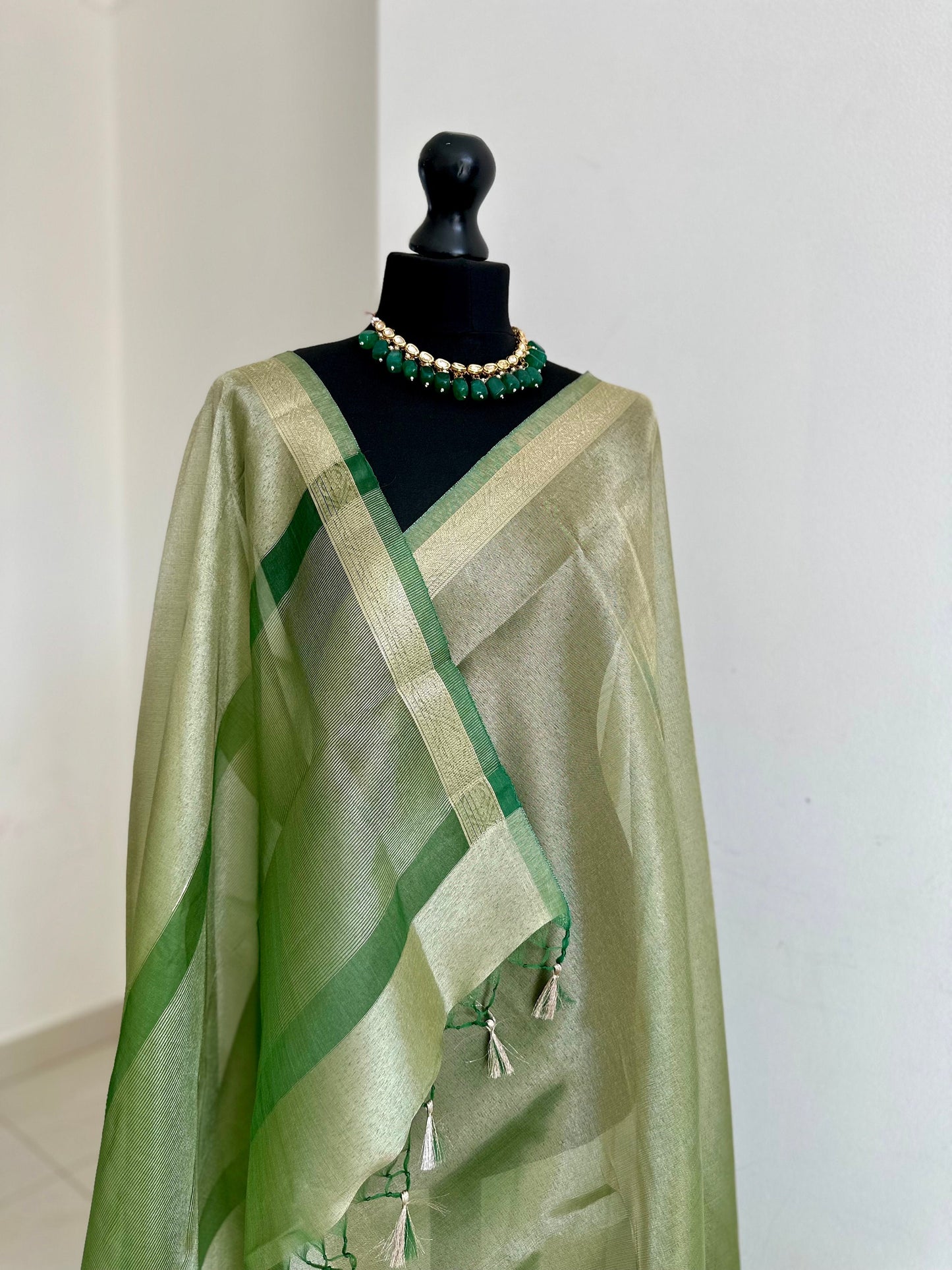 Apple green shimmer soft tissue saree with border and unstitched blouse. Soft green wedding guest party traditional saree unique saree look