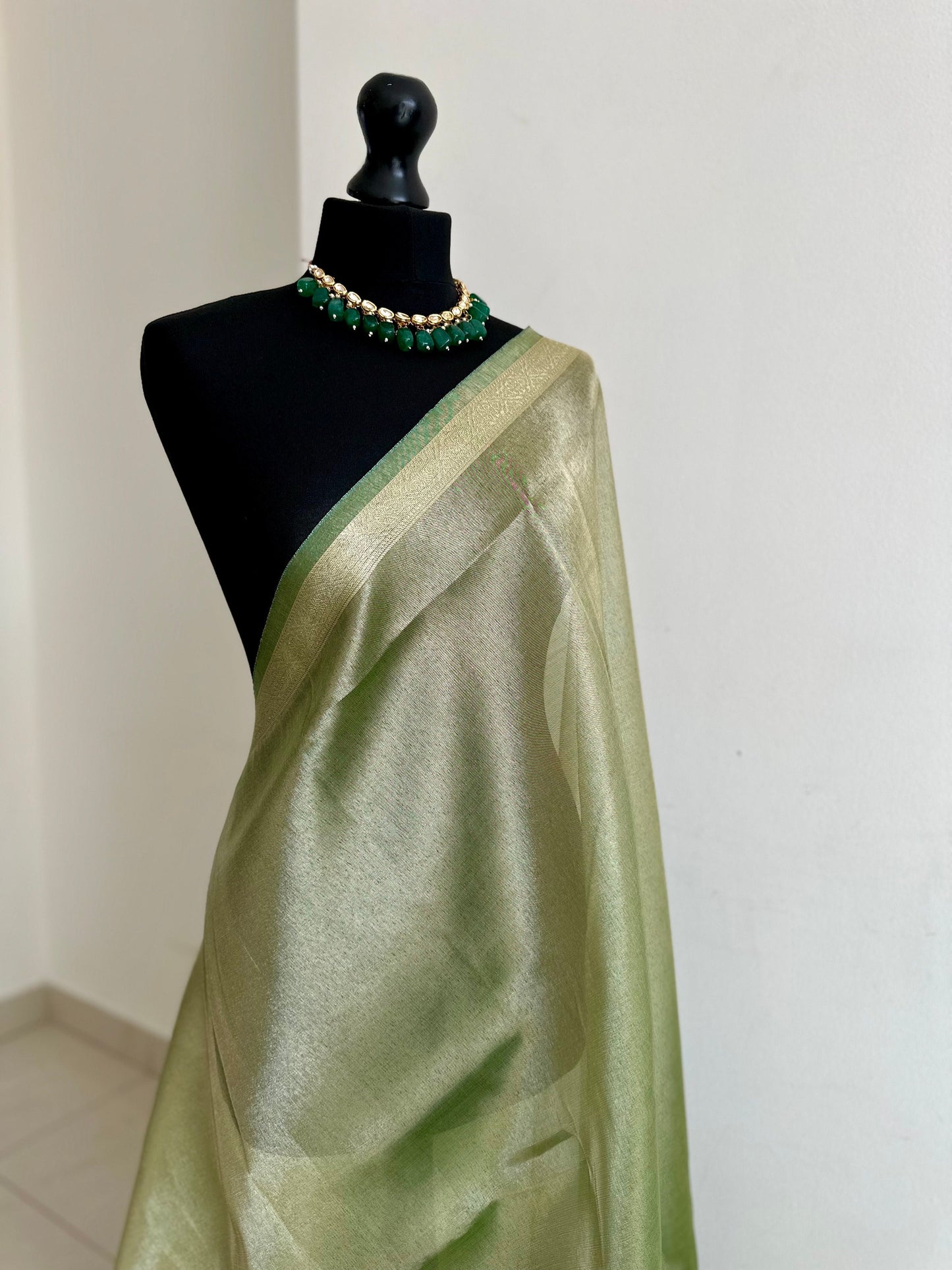 Apple green shimmer soft tissue saree with border and unstitched blouse. Soft green wedding guest party traditional saree unique saree look