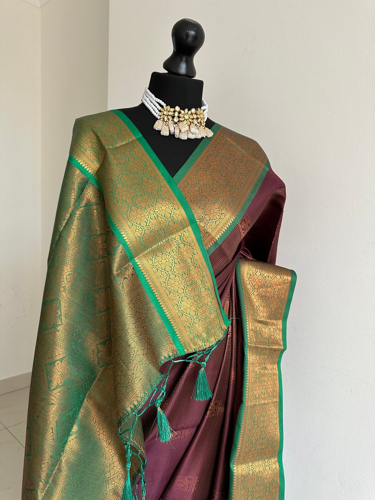 Wine colour saree with green border with copper zari and sheen. Traditional silk saree beautiful colour and design. Designer saree