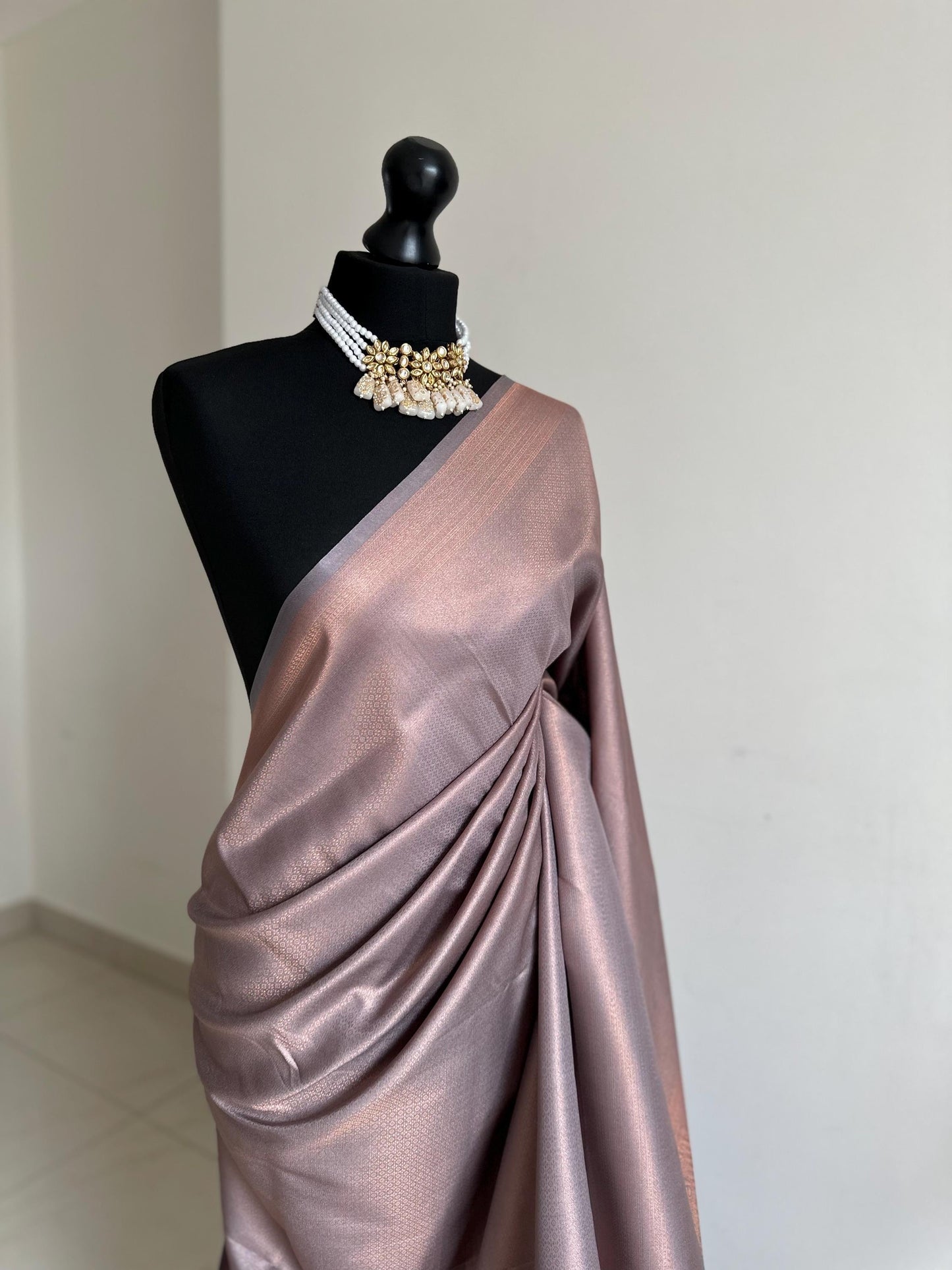 Grey soft silk saree with a copper border and all over sheen. Kubera pattu Sarees for wedding parties events pattu sarees for bridesmaids