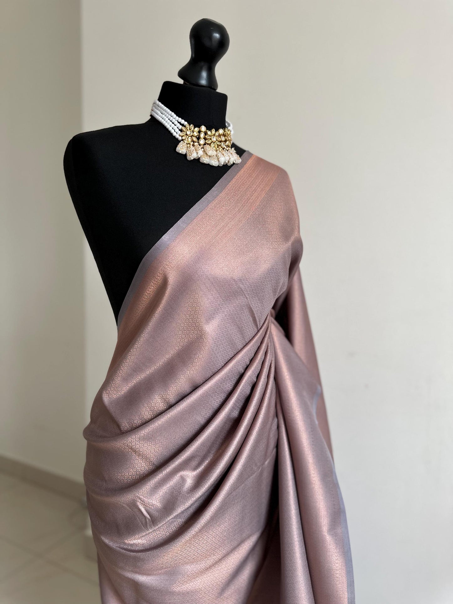 Grey soft silk saree with a copper border and all over sheen. Kubera pattu Sarees for wedding parties events pattu sarees for bridesmaids