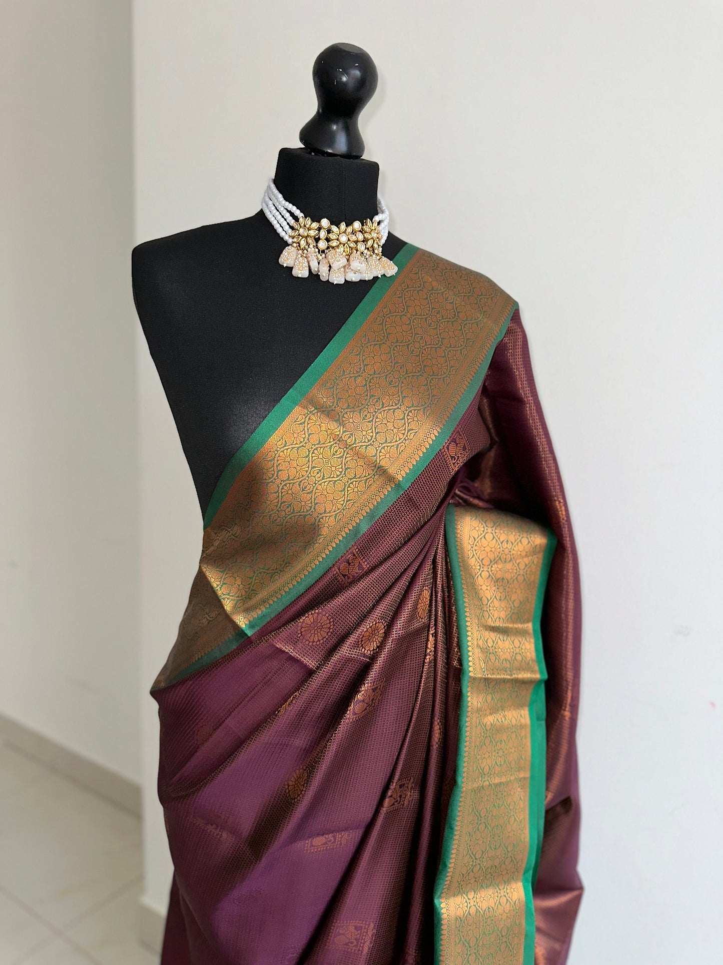 Wine colour saree with green border with copper zari and sheen. Traditional silk saree beautiful colour and design. Designer saree