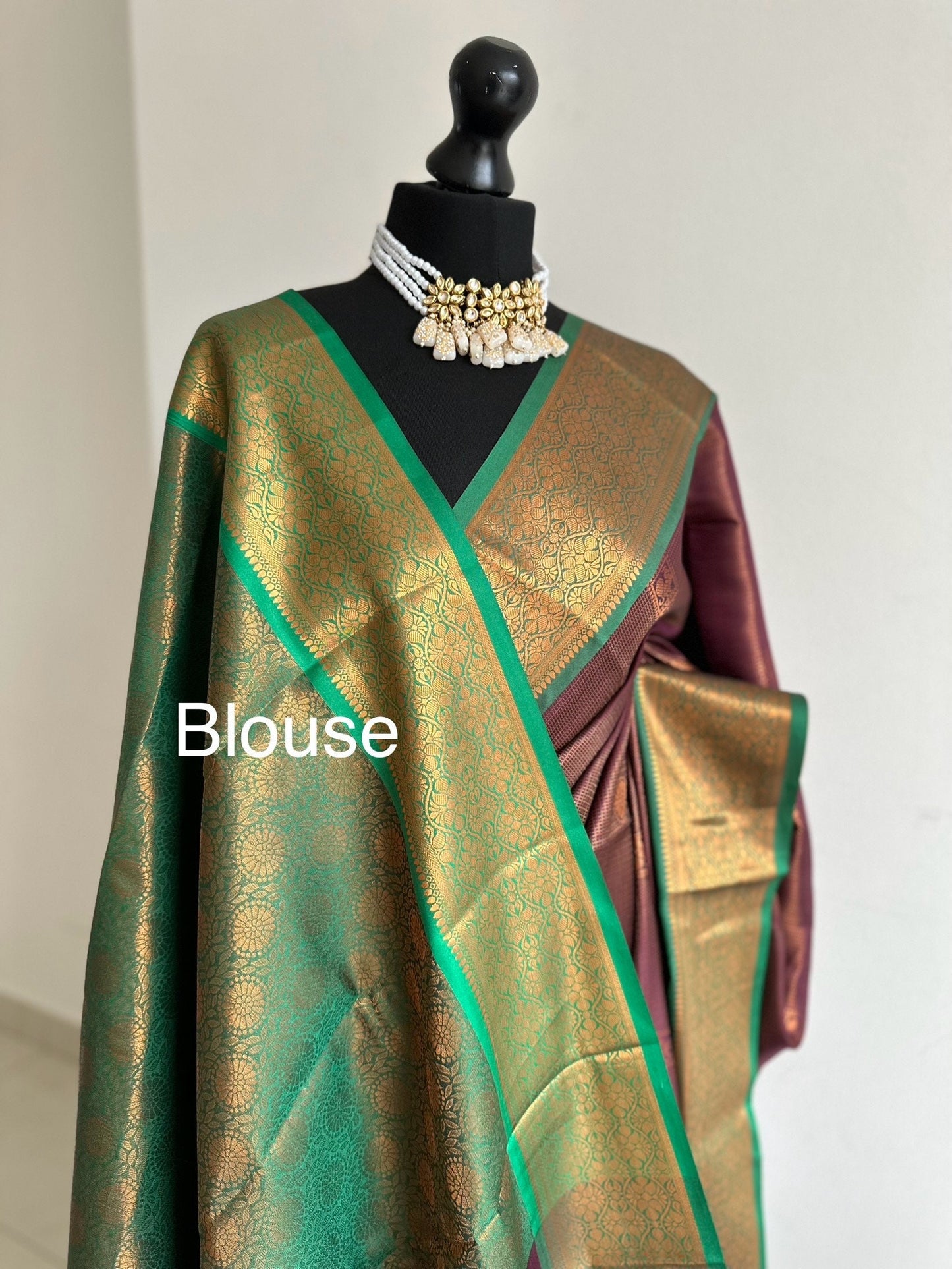 Wine colour saree with green border with copper zari and sheen. Traditional silk saree beautiful colour and design. Designer saree