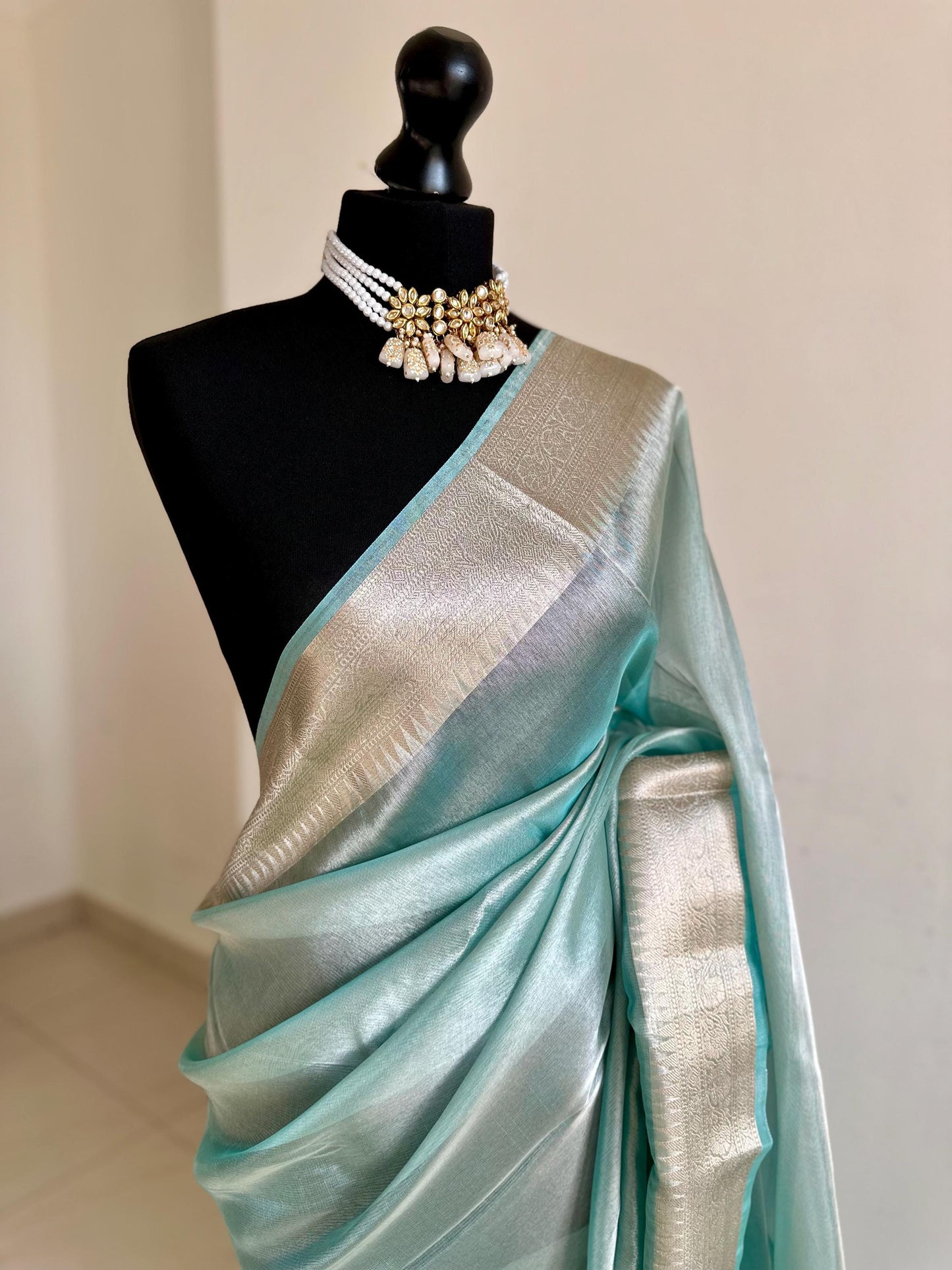 Pale blue shimmer soft tissue saree with border and unstitched blouse. Soft blue wedding guest party traditional saree unique saree look