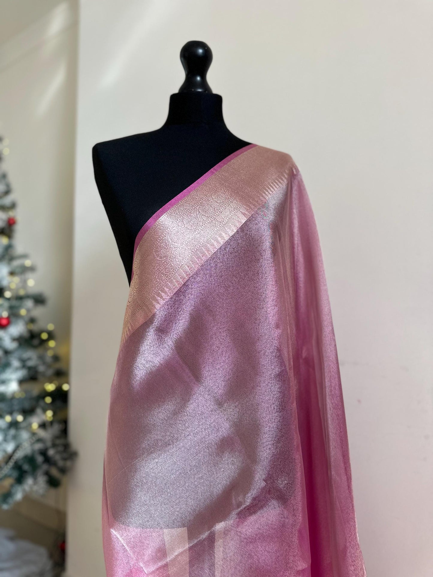 Pale pink shimmer soft tissue saree with border and unstitched blouse. Soft pink wedding guest party traditional saree unique saree look