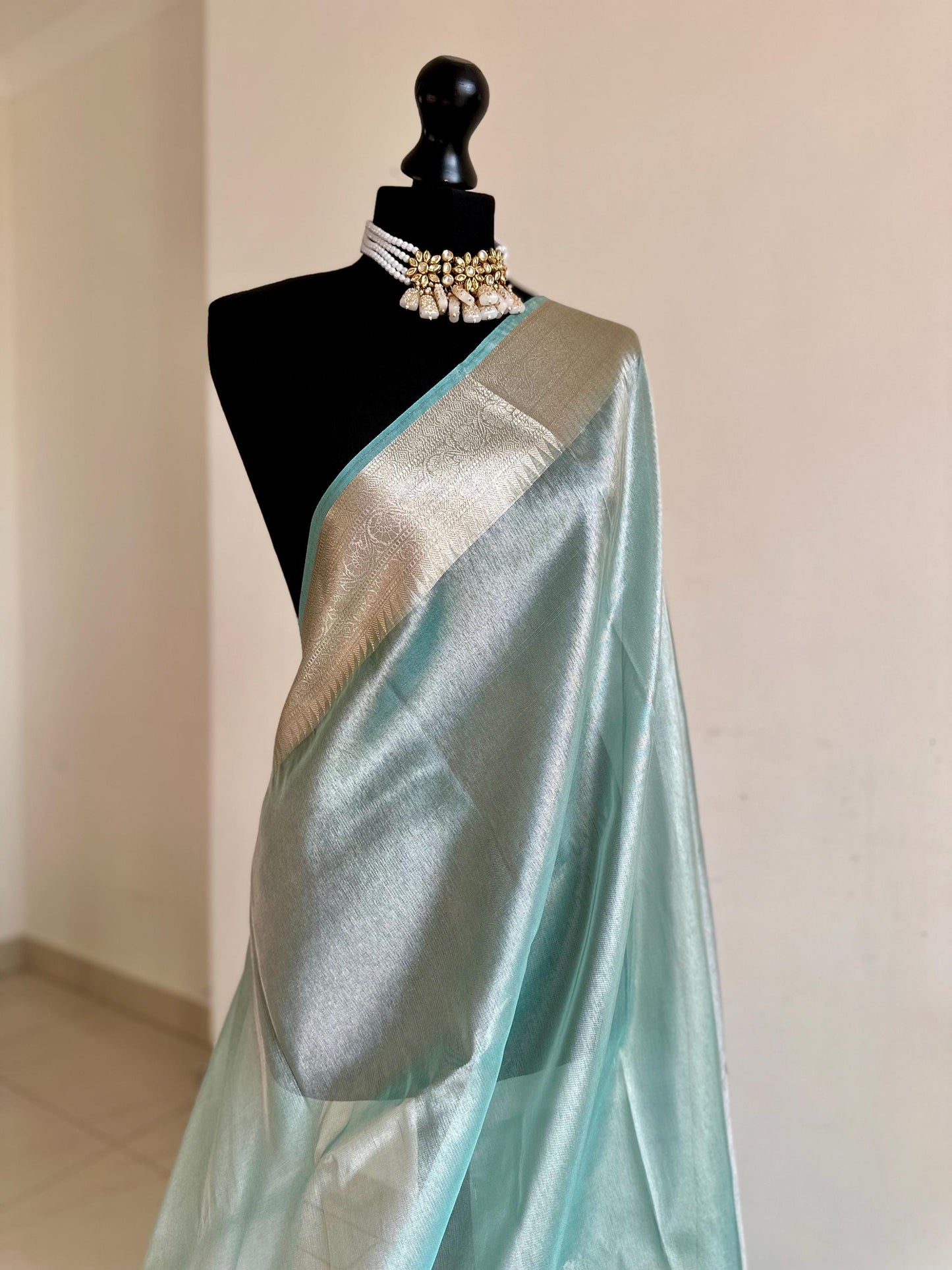 Pale blue shimmer soft tissue saree with border and unstitched blouse. Soft blue wedding guest party traditional saree unique saree look