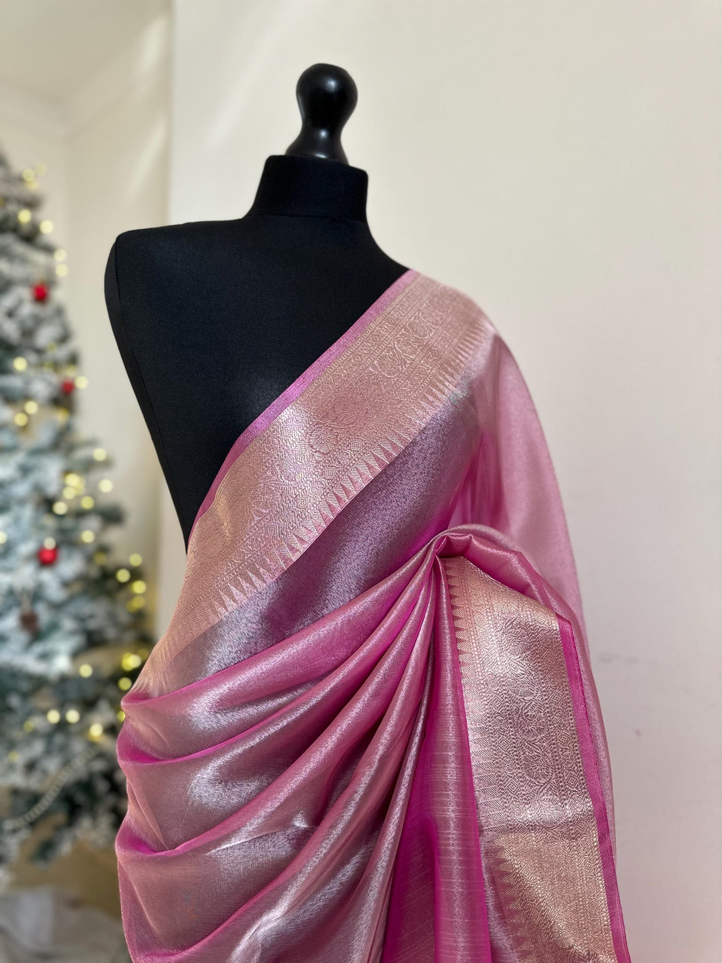 Pale pink shimmer soft tissue saree with border and unstitched blouse. Soft pink wedding guest party traditional saree unique saree look