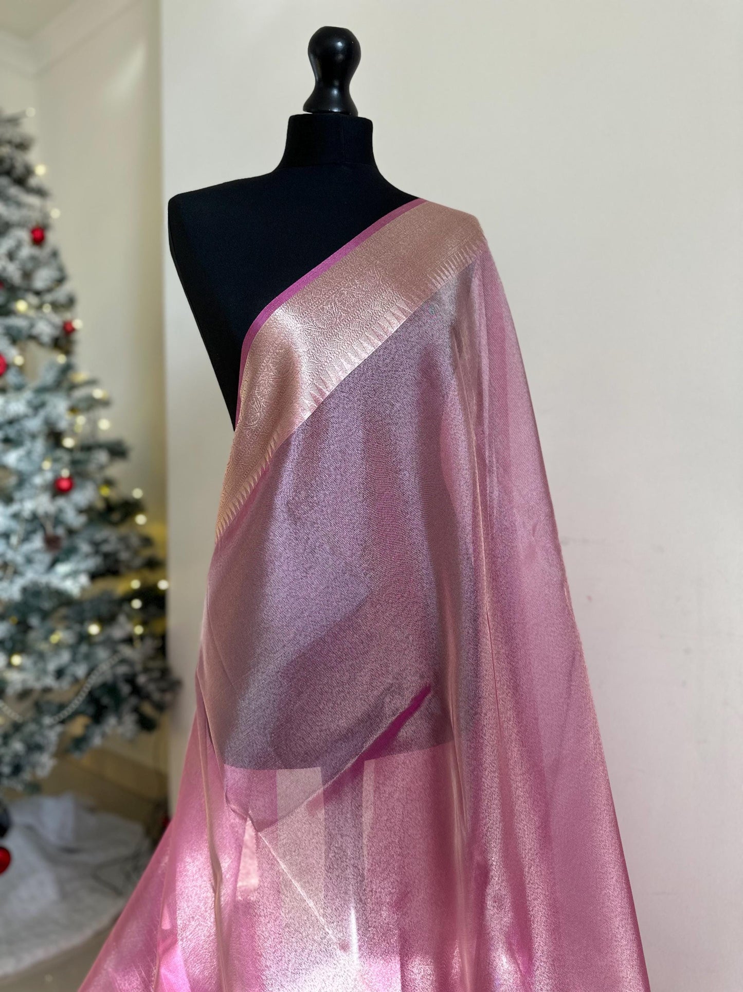 Pale pink shimmer soft tissue saree with border and unstitched blouse. Soft pink wedding guest party traditional saree unique saree look