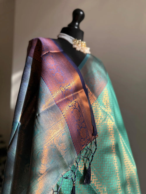Authentic green saree with navy blue border  copper zari and sheen. Traditional silk saree beautiful colour and design. Designer saree