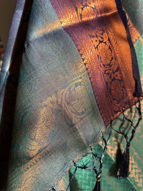 Authentic green saree with navy blue border  copper zari and sheen. Traditional silk saree beautiful colour and design. Designer saree