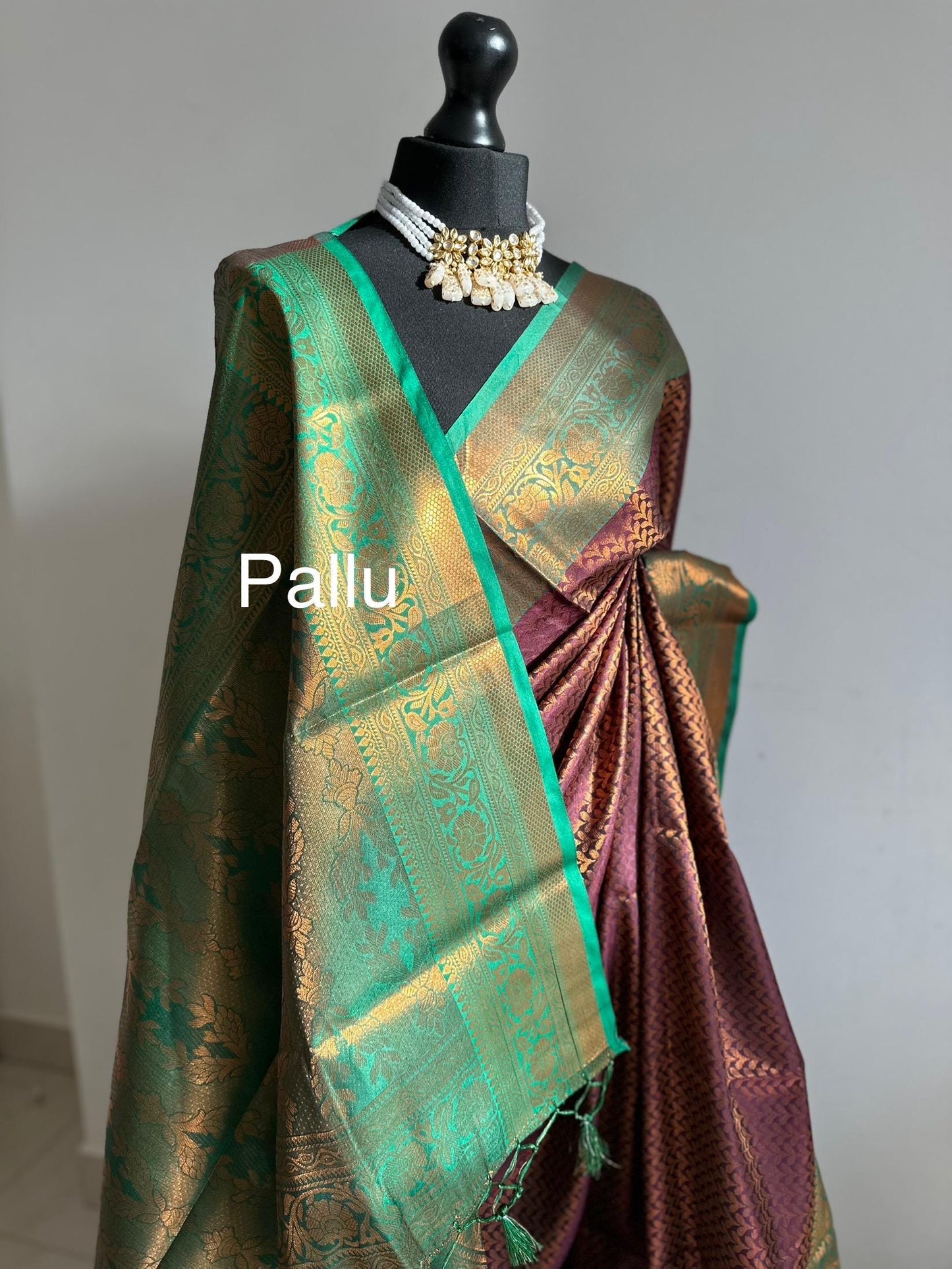 Wine colour saree with green border with copper zari and sheen. Traditional silk saree beautiful colour and design. Designer saree